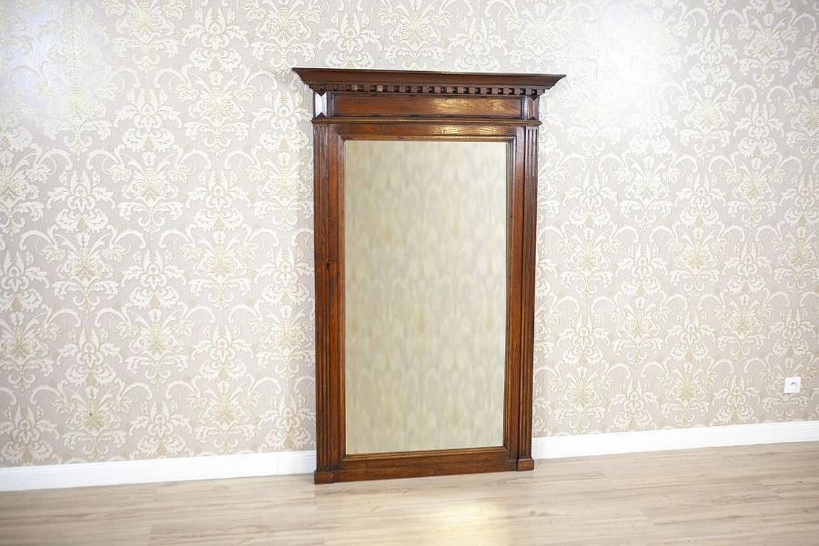 Renaissance Revival Mirror From the Early 20th Century in Brown Oak Frame

We present you this big Renaissance Revival mirror from the early 20th century in an oak frame.
The wood has been restored. The mirror surface bears traces of time.