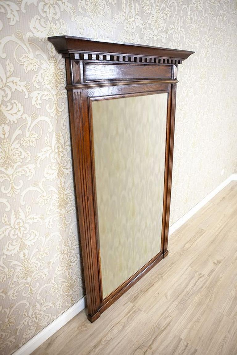 European Renaissance Revival Mirror From the Early 20th Century in Brown Oak Frame For Sale