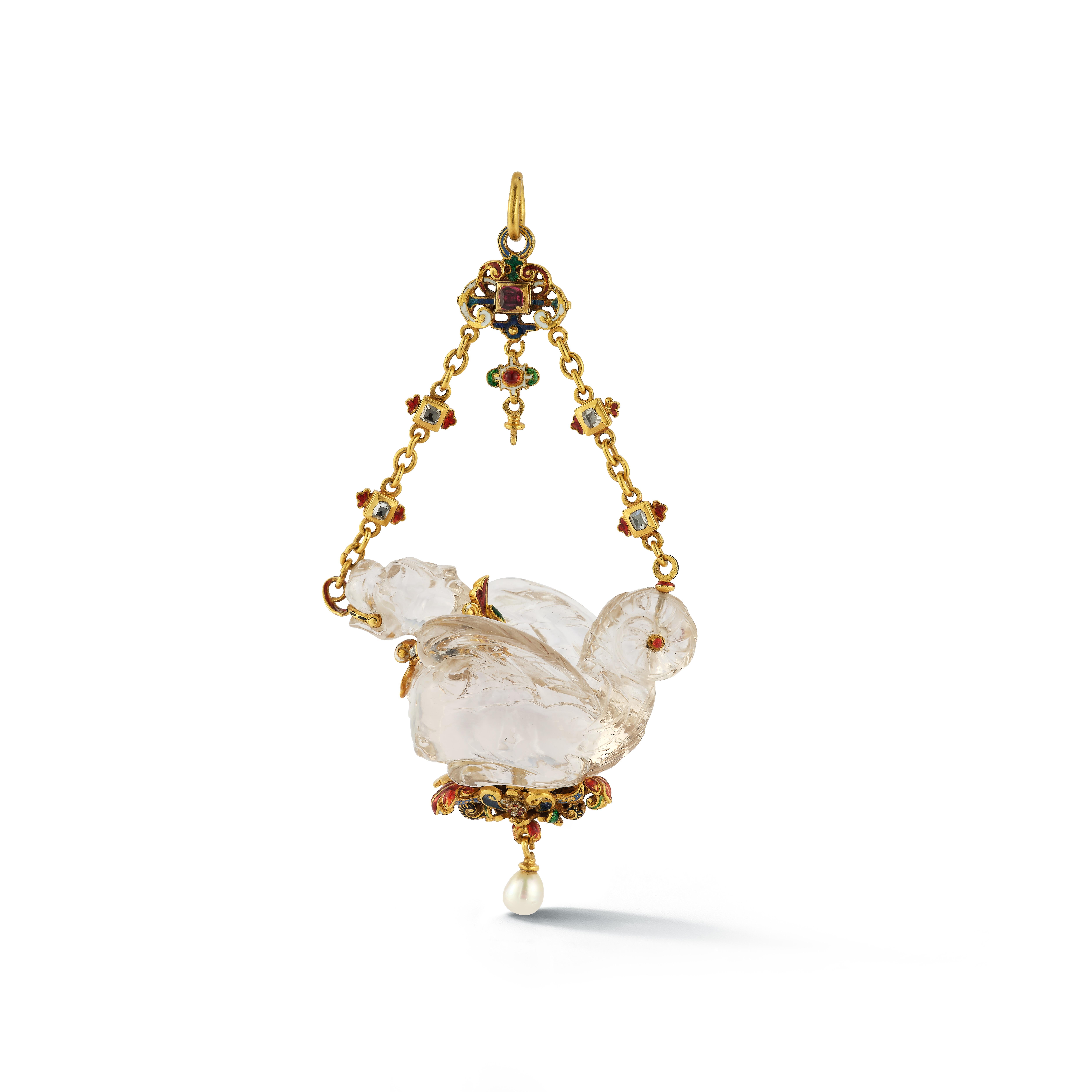 Renaissance Revival Rock Crystal Dragon Pendant-

A rock crystal dragon mounted in 18k gold set with diamonds, a pearl, and rubies

Length: 4.5
