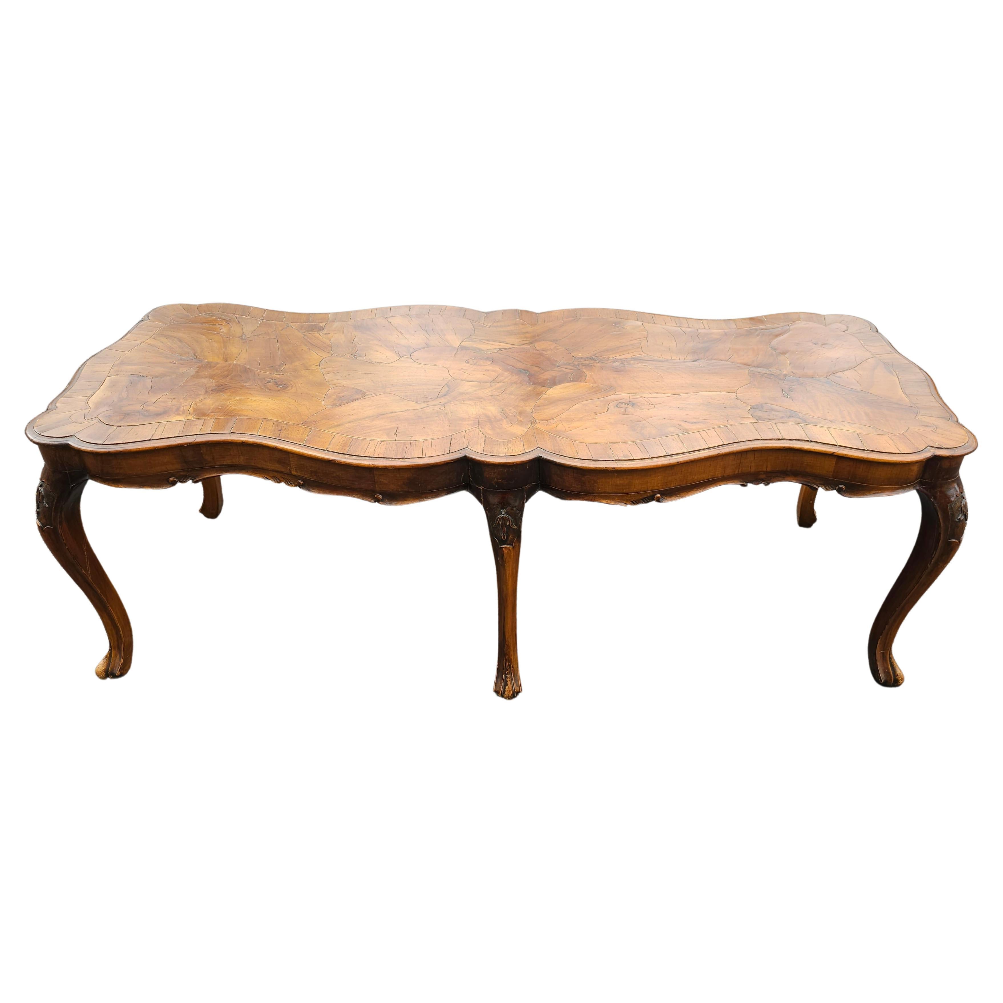 A rare Renaissance Revival Walnut Burl and Fruitwood Cocktail Table with generous size. 
Measures 55.5