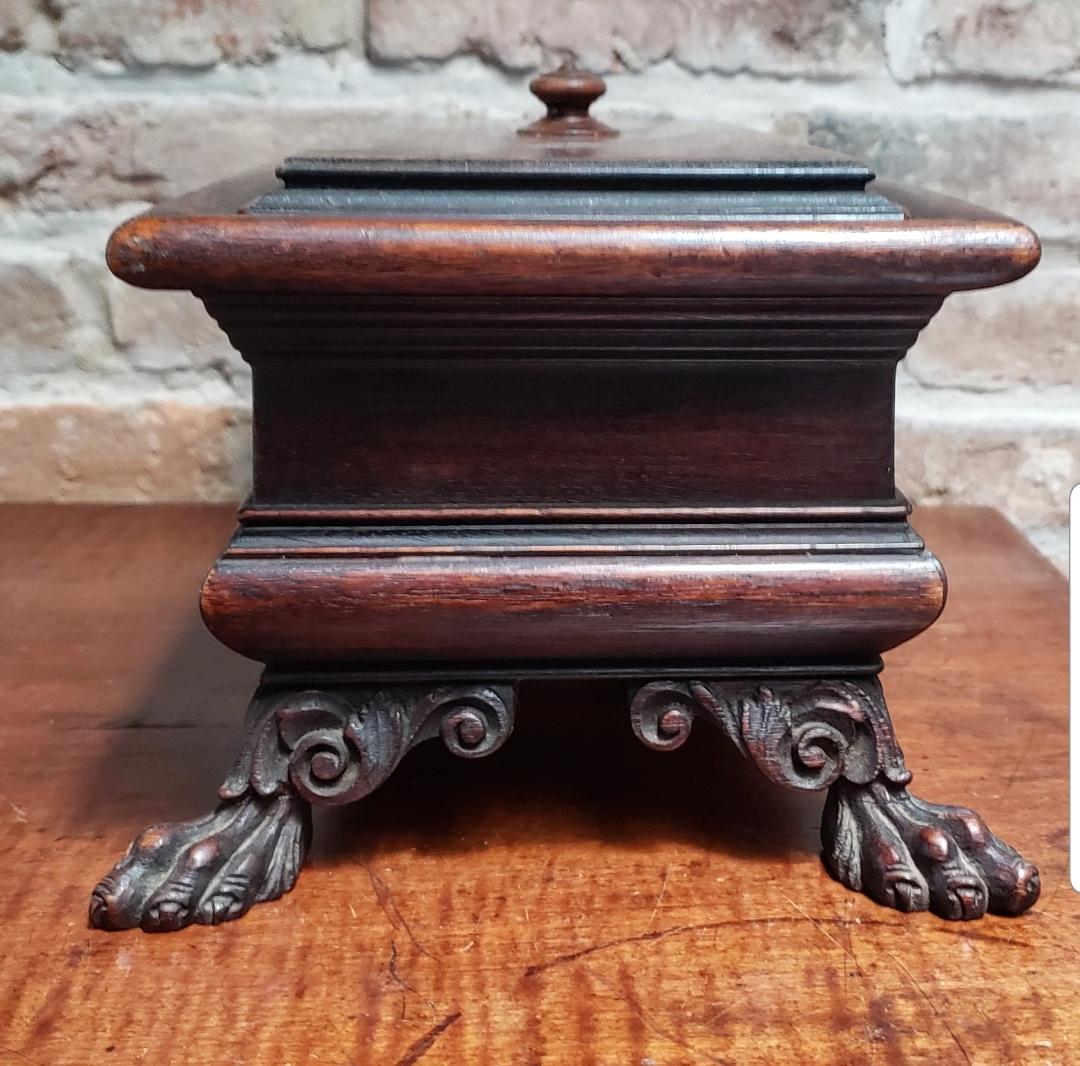 A very nicely done desk or dresser top box. Made from carved walnut and retaining the original finish.
Would also be great for the television remote or any other items you might like to place in it.