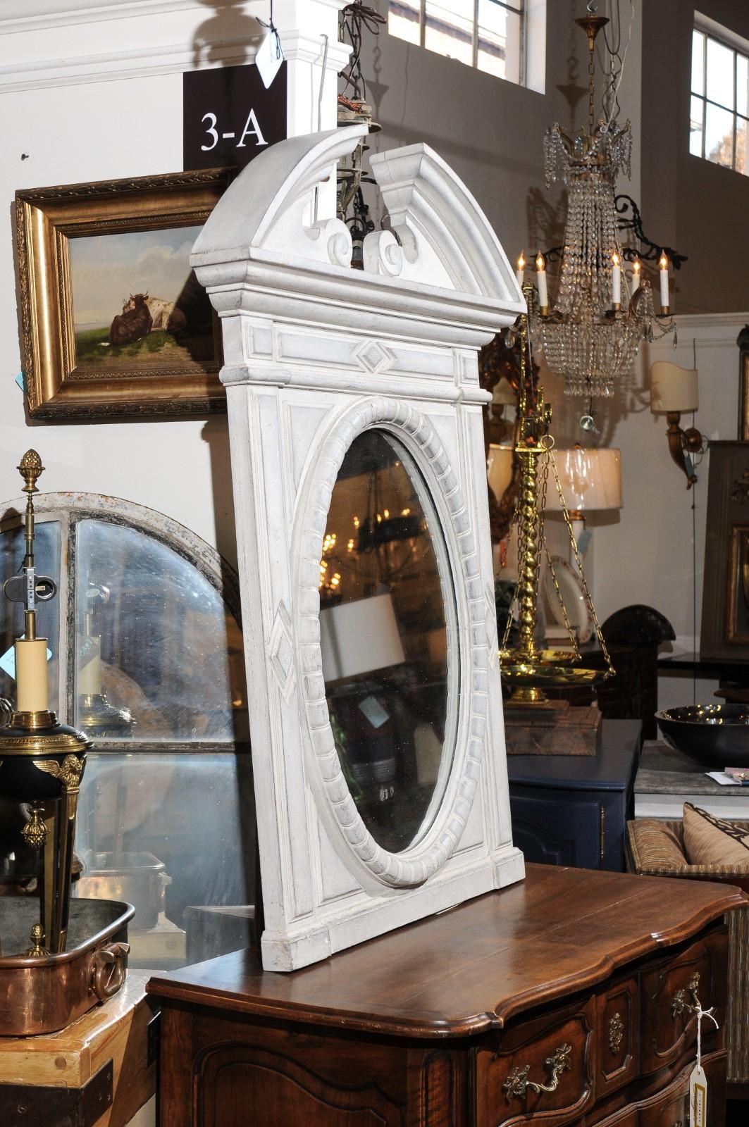Carved Renaissance Style 1850s Belgian Painted Oval Mirror with Broken Arch Pediment For Sale
