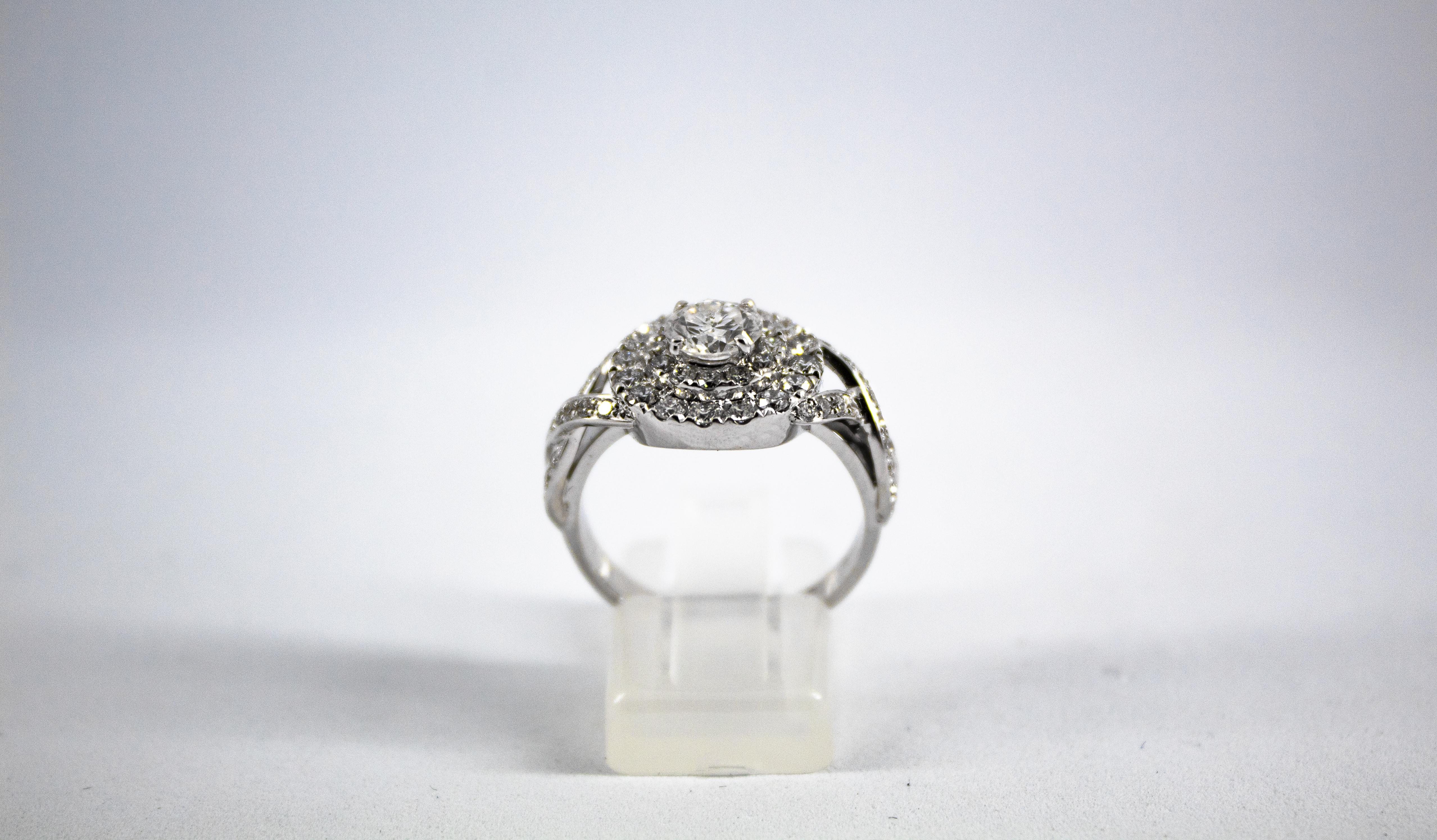 This Ring is made of 18K White Gold.
This Ring has a Central 0.86 Carats White Diamond.
This Ring has 1.15 Carats of White Diamonds.
Size ITA: 18 USA: 8 1/4
We're a workshop so every piece is handmade, customizable and resizable.
