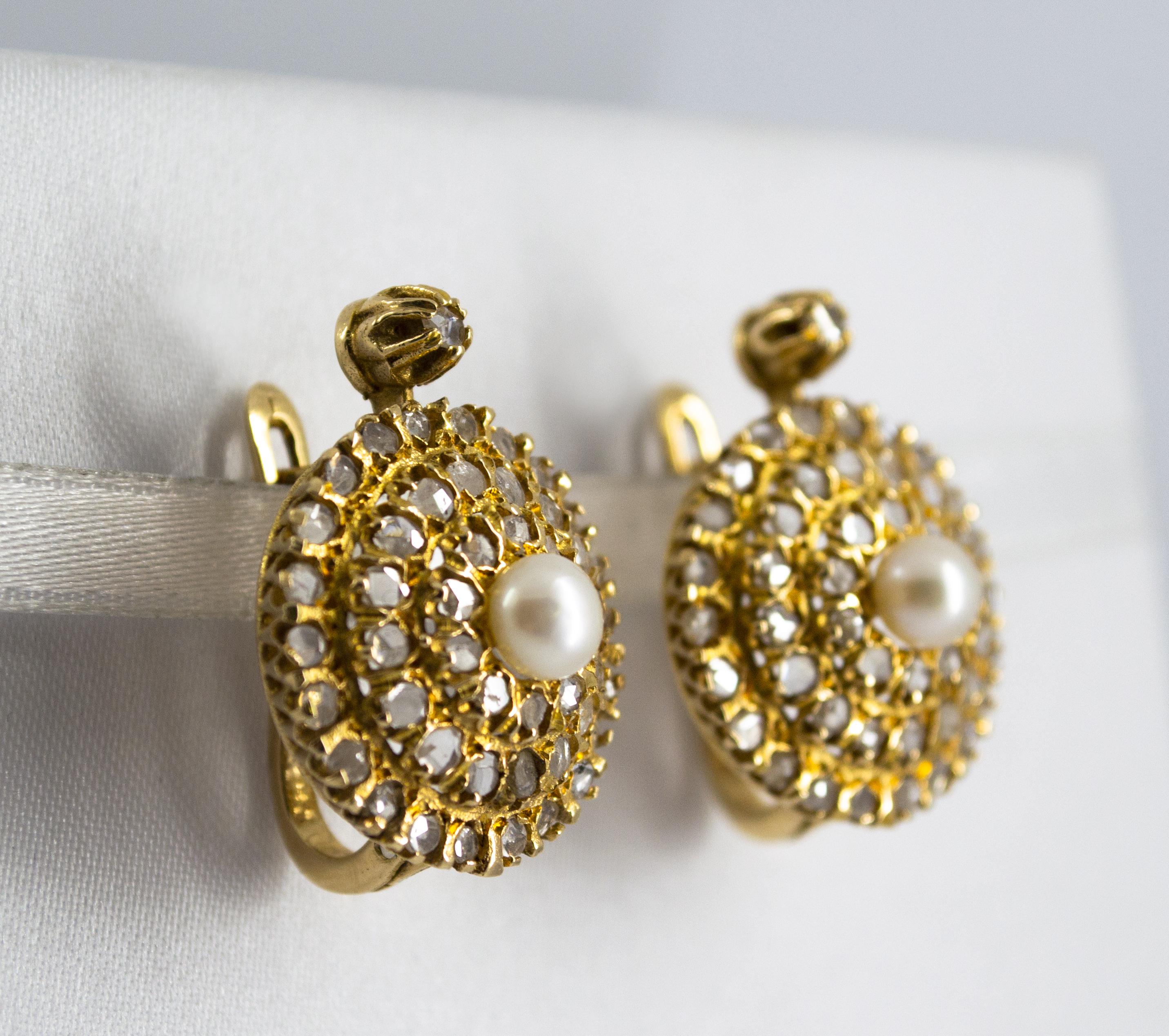 These Earrings are made of 9K Yellow Gold.
These Earrings have 2.20 Carats of Diamonds.
These Earrings has Pearls.
All our Earrings have pins for pierced ears but we can change the closure and make any of our Earrings suitable even for non-pierced