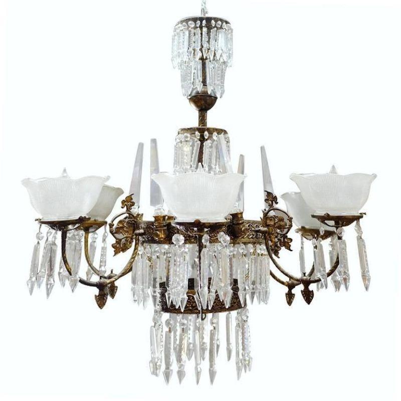 Romanesque style Six-light electric chandelier featuring a mix of hang crystal and handkerchief shade shades, circa 1980.

Available-2.