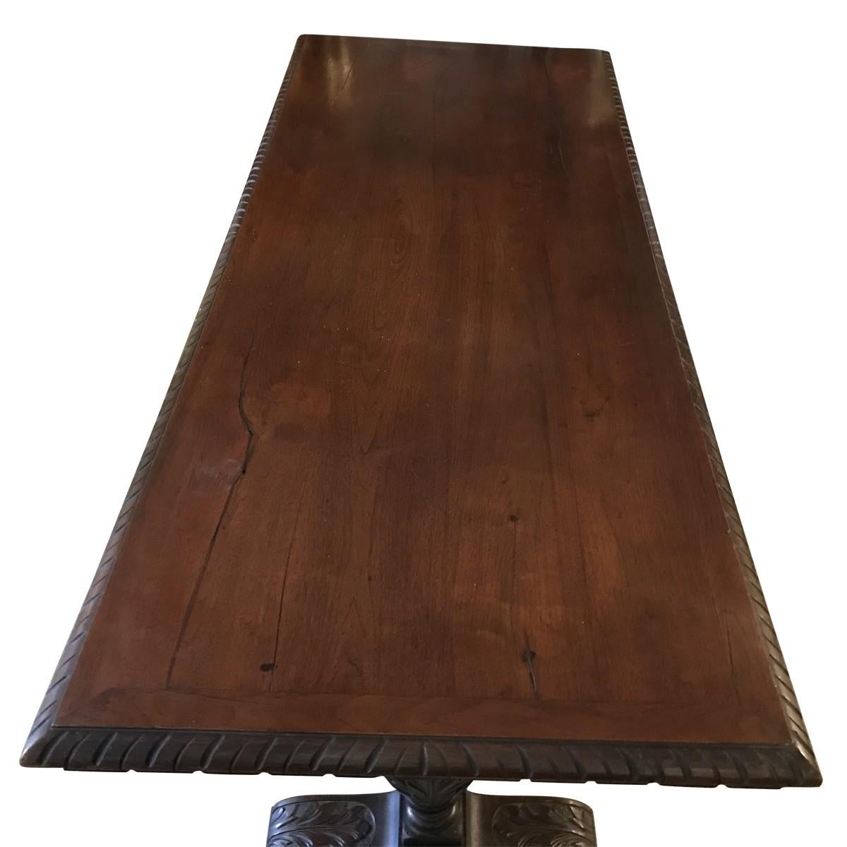 Traditional furniture is perfect for home designers looking to create a comfortable and timeless sophistication in their households. Rendered in solid walnut, this Renaissance style carved refectory table is a stunning piece. It features a fully