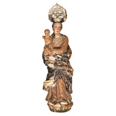 Madonna col Bambino in legno intagliato in stile rinascimentale, scuola italiana, XVI-XVII secolo