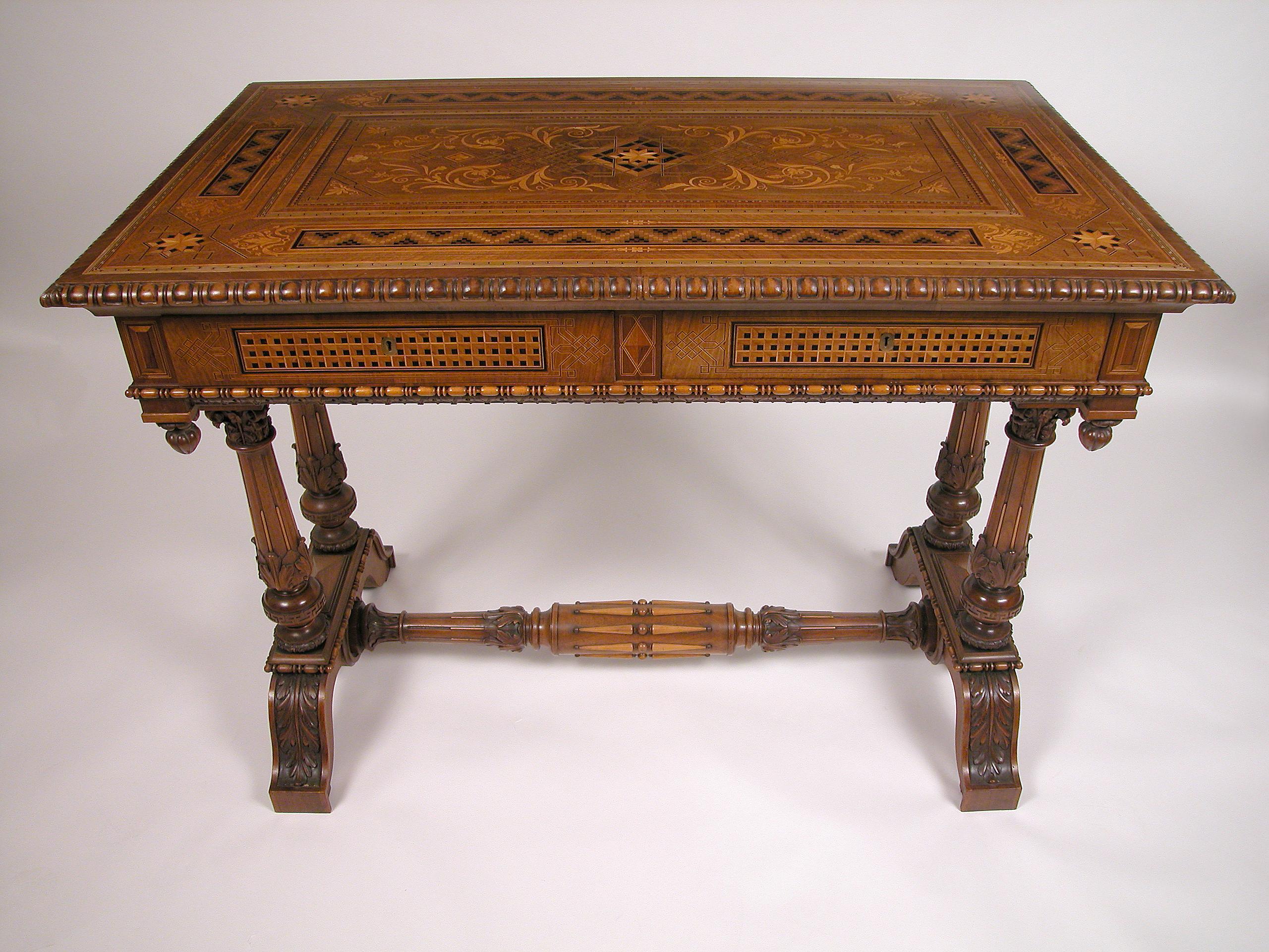 Label mentioning “I.R. Scuola, Sezione Intarsio e Intaglio, Cortina d’Ampezzo, n°146”

Exceptional Venetian Renaissance style center table. The top and the frieze opening with four drawers are fully ornamented with a flat carved decoration and a