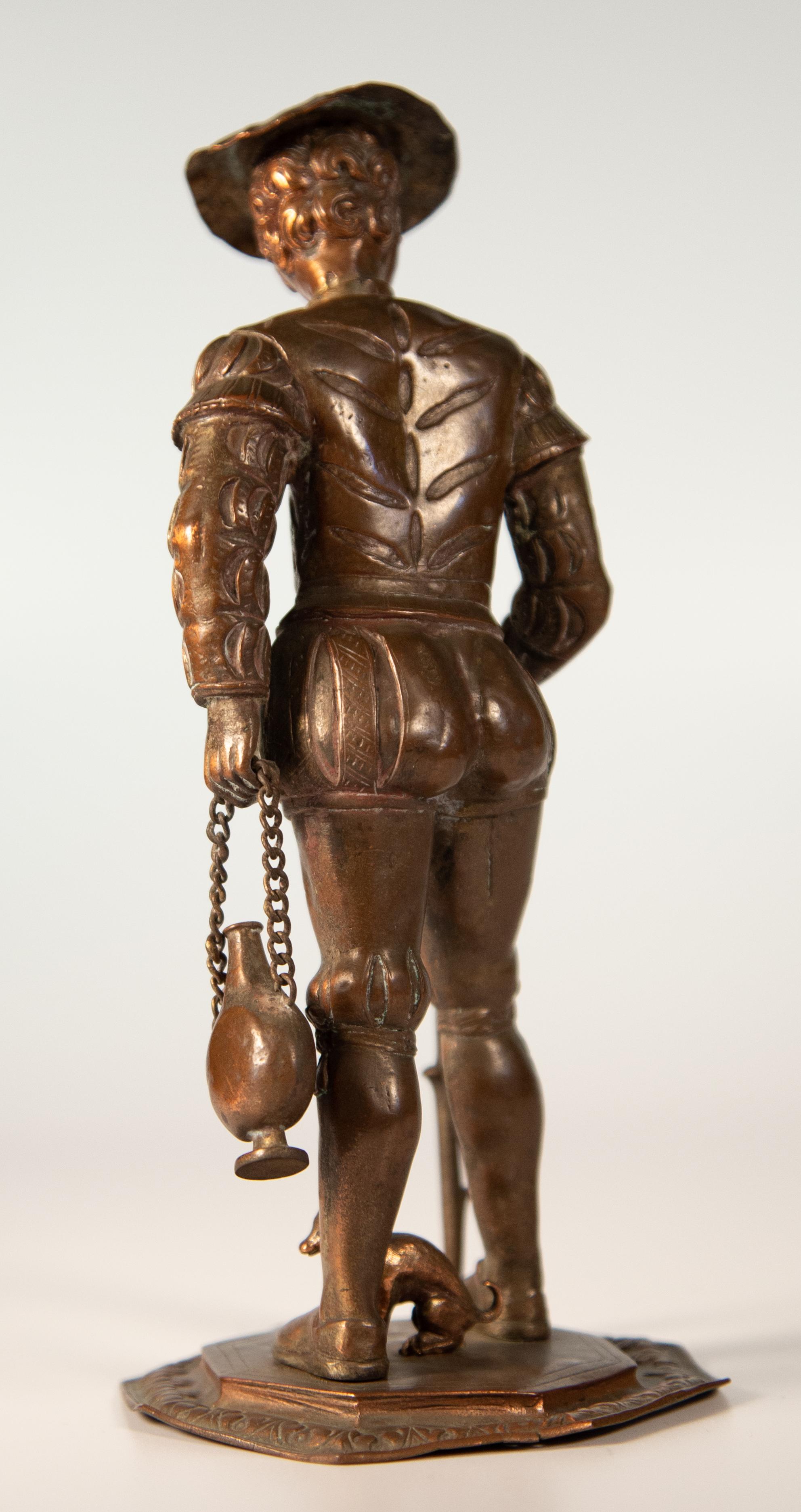 Repoussé Renaissance Style Copper Figure of a Pilgrim with a Small Dog, circa 1860 For Sale