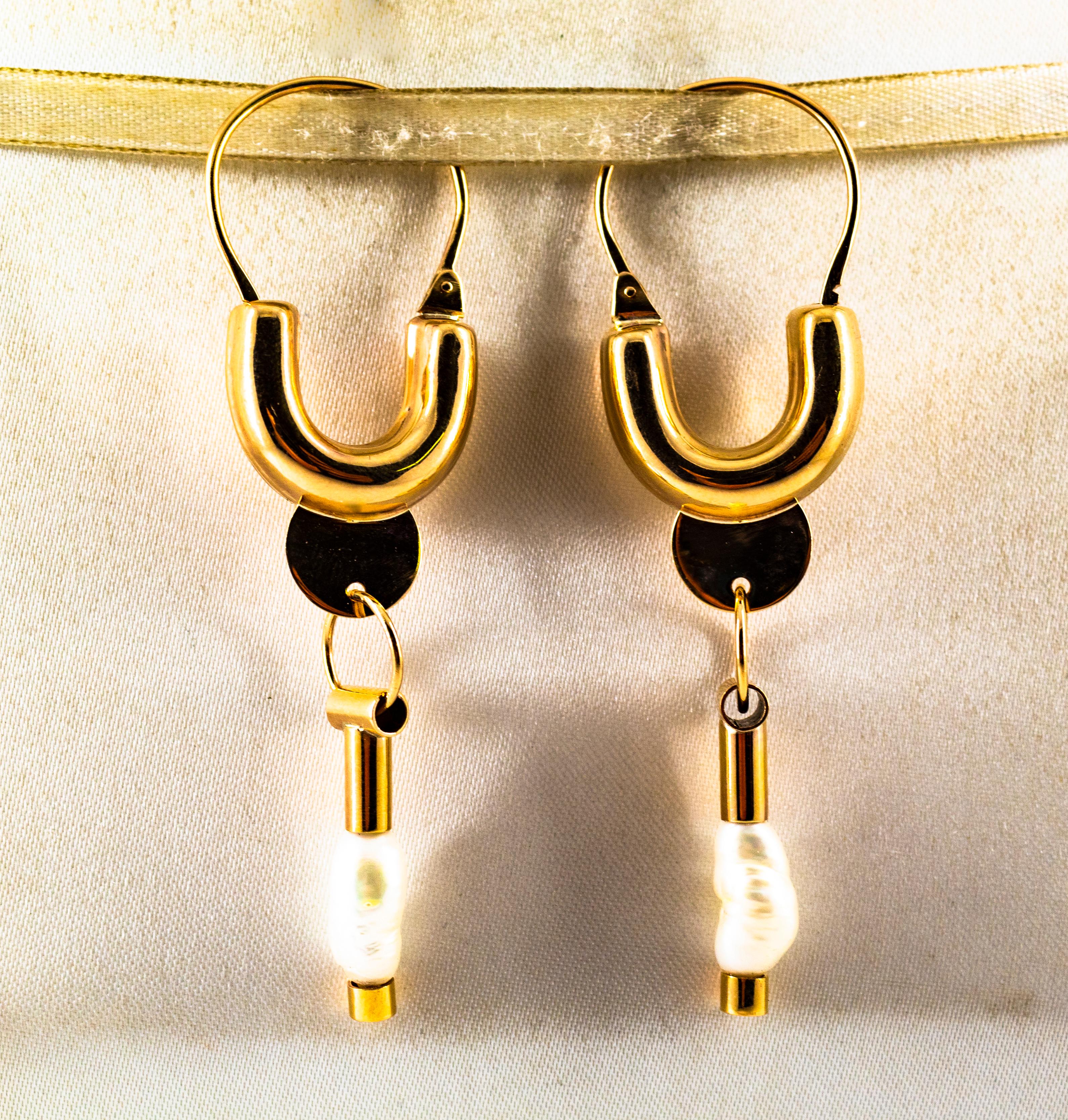 These Lever-Back Earrings are made of 9K Yellow Gold.
These Earrings have Cultured Pearls.
All our Earrings have pins for pierced ears but we can change the closure and make any of our Earrings suitable even for non-pierced ears.
We're a workshop so