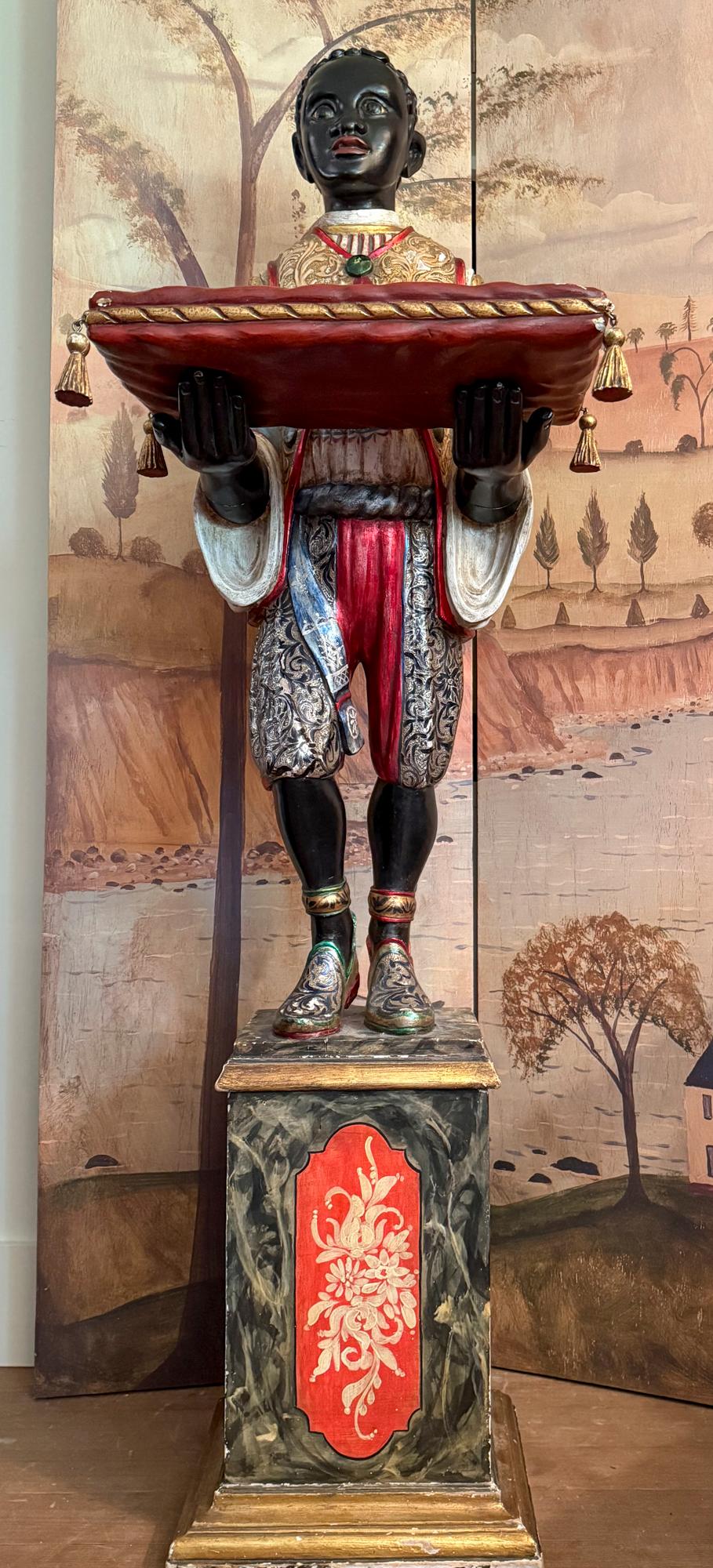 Renaissance Style, Italian Carved Wood Blackamoor, (from a Mario Buatta  Apt. N Y). From a Park Ave apt in NYC decorated by Mario Buatta (1935-2018) in the 80s. A dignified young servant dressed in the finery of the Baroque era. Very detailed