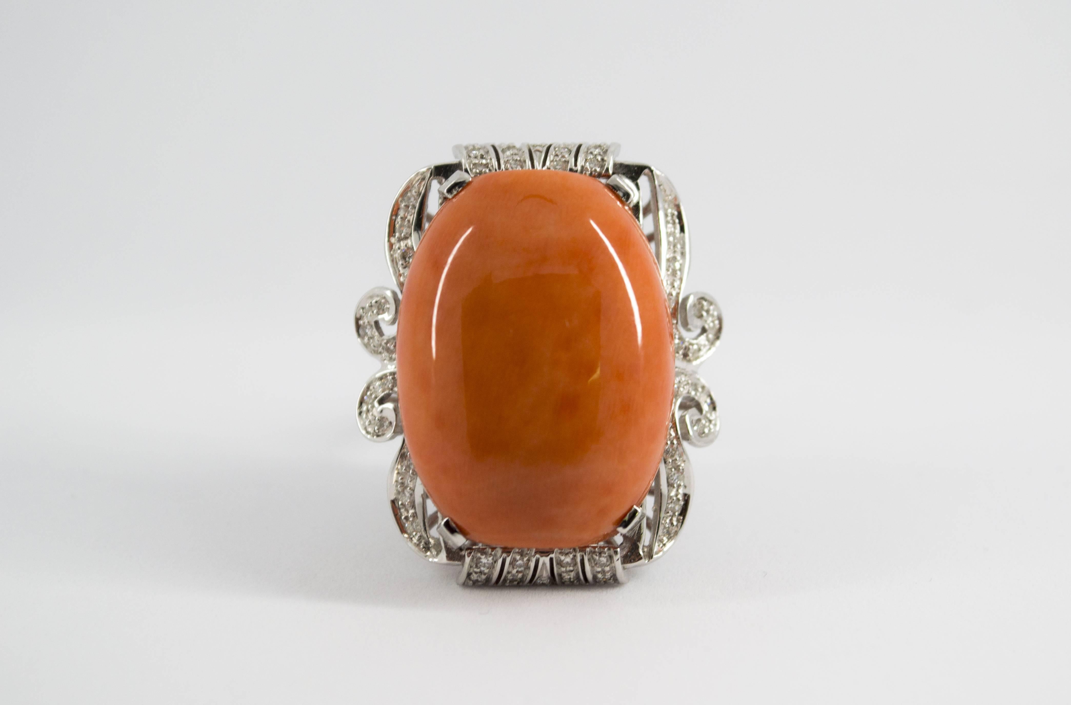 This Ring is made of 18K White Gold.
This Ring has 0.40 Carats of Diamonds.
This Ring has also Mediterranean (Sardinia, Italy) Peach Coral.
This Ring is inspired by Renaissance Style.
Size ITA: 18 USA: 8 1/4
We're a workshop so every piece is