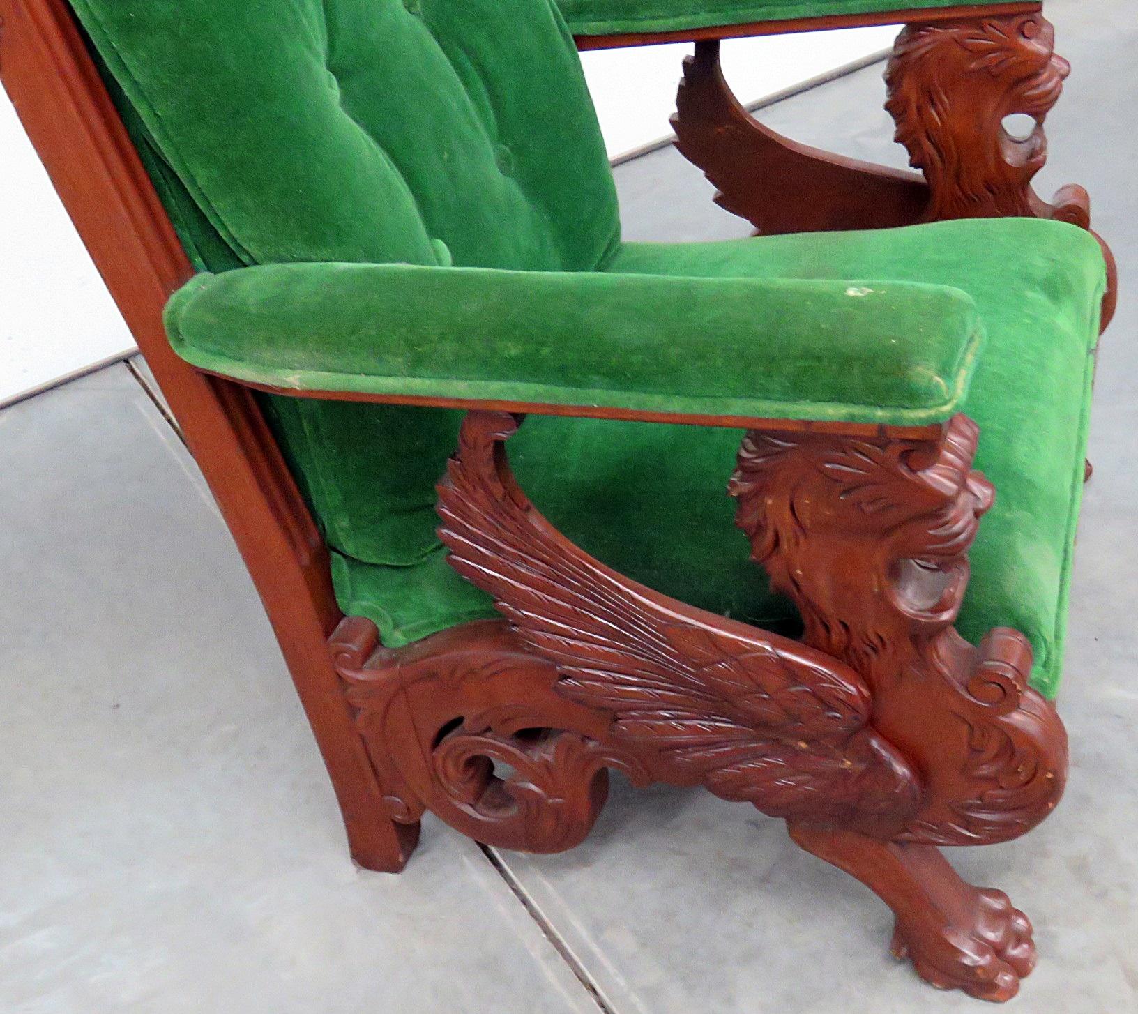 Renaissance style carved winged griffin chair, attributed to RJ Horner.