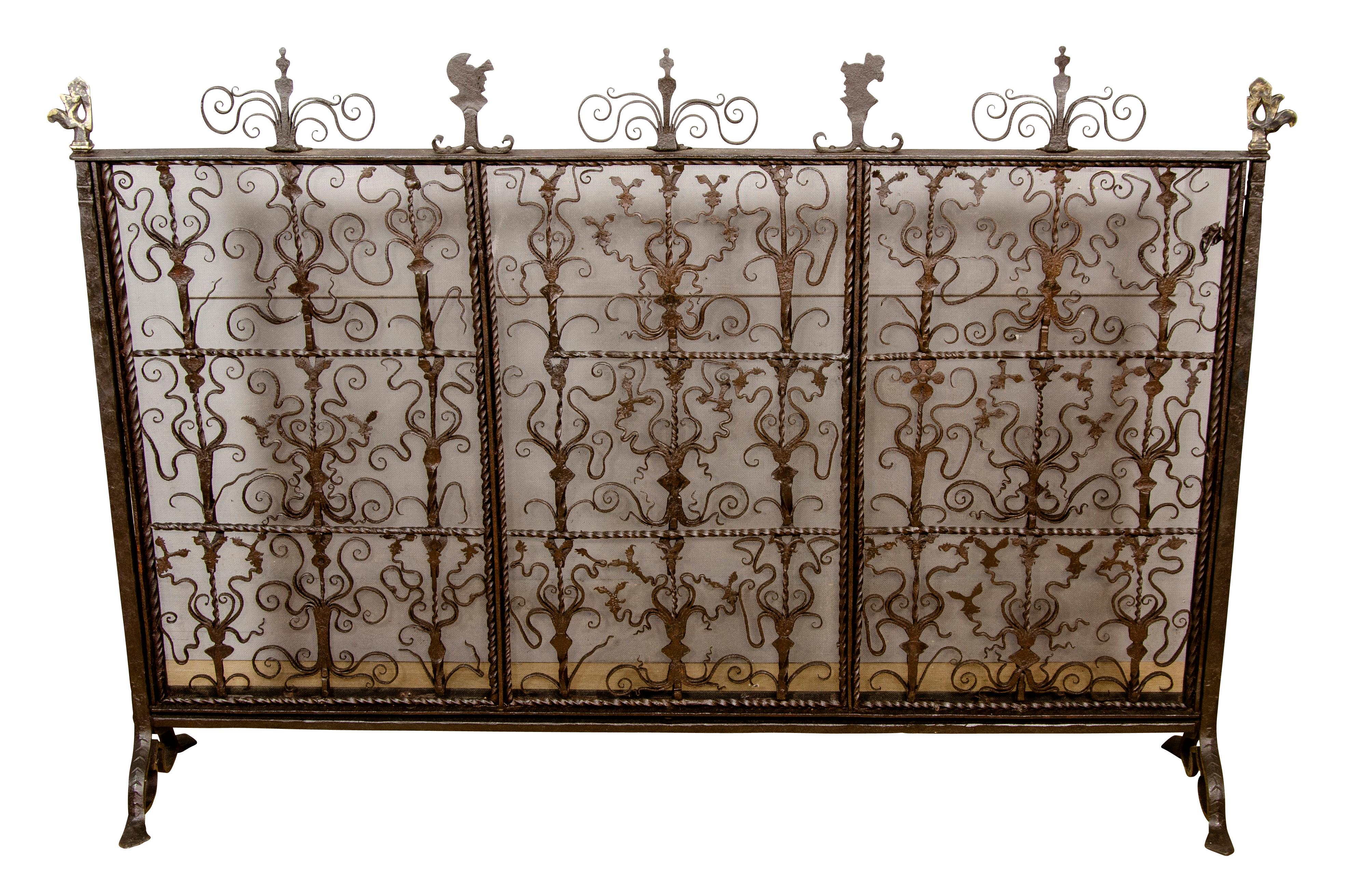 Large and grand scale wonderfully hand wrought with various forms of wrought decoration .