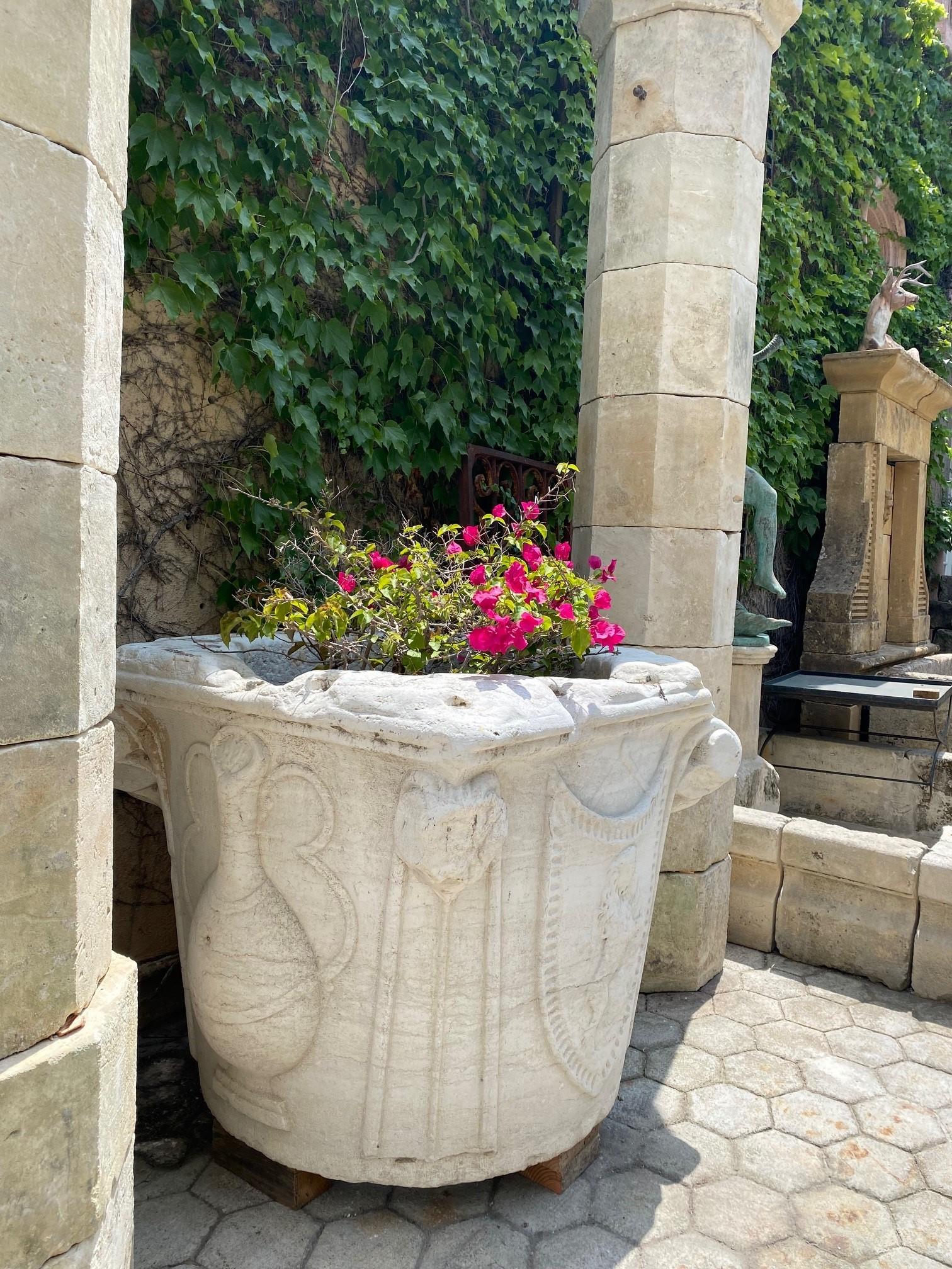 Renaissance Wellhead Hand Carved Marble Container Planter Basin Water Fountain . A rare and impressive Historic Italian 15th century Renaissance hand carved marble well head square shape with scrolls to the corners. Decorated with 3-dimensional