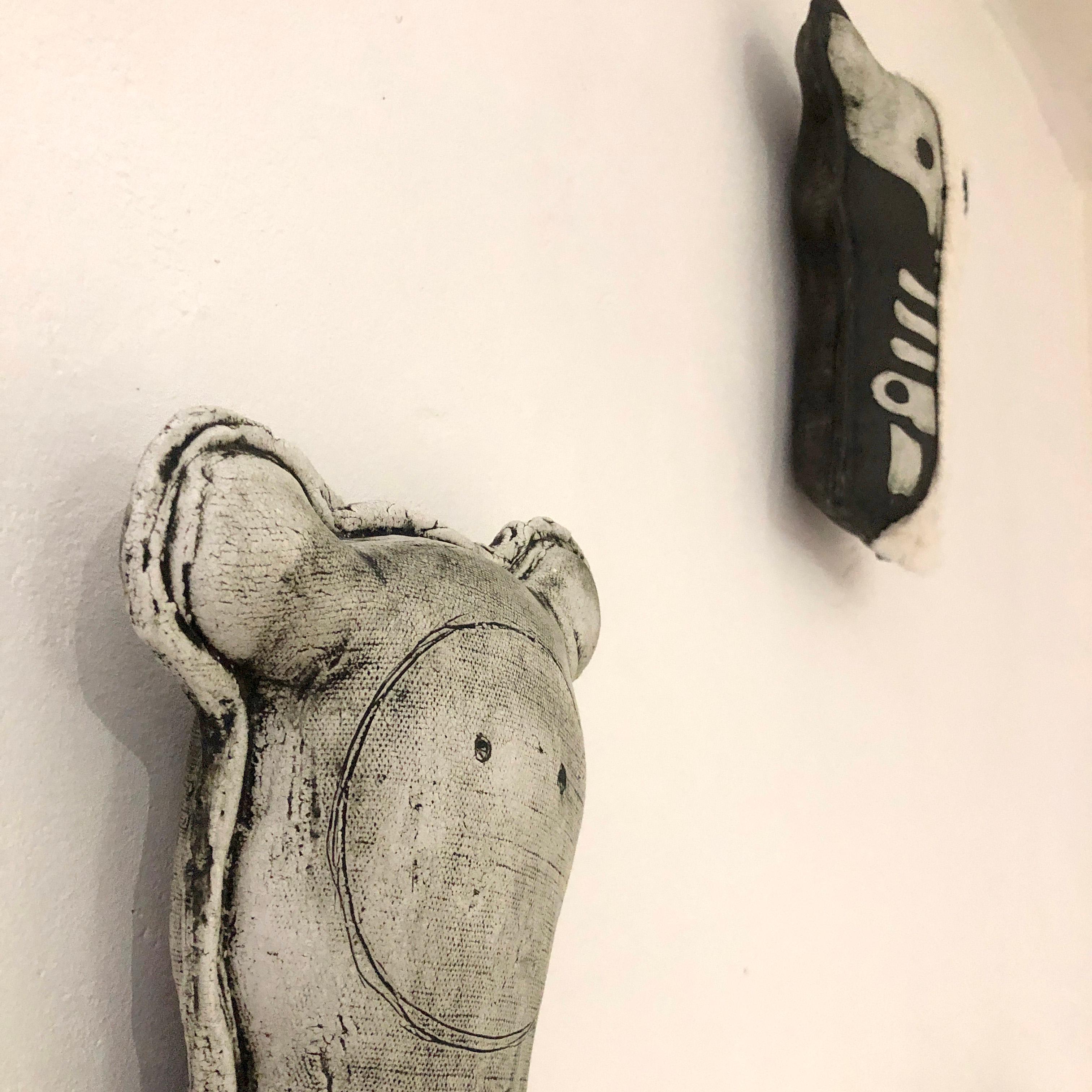 Introducing Théodora Catharina the first or simply Teddy C, a cuddly ceramic teddy bear half Teddy half fluff to hang on your wall. 

Combining contemporary aesthetics with a touch of rebellion and  urban charm. Crafted by the skilled hands of