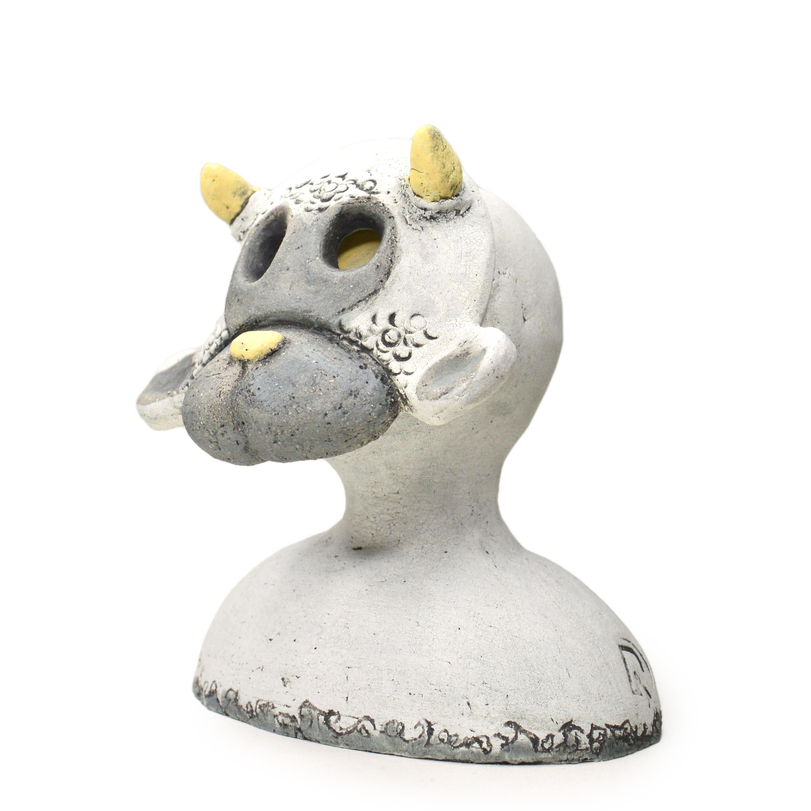 Pineco number 0007 Original Ceramic sculpture with a sheep mask representing simplicity, gentleness, fearlessness and bravery.

Meet a variety of characters with distinct masks and postures. These sculptures are fascinating and make you curious,