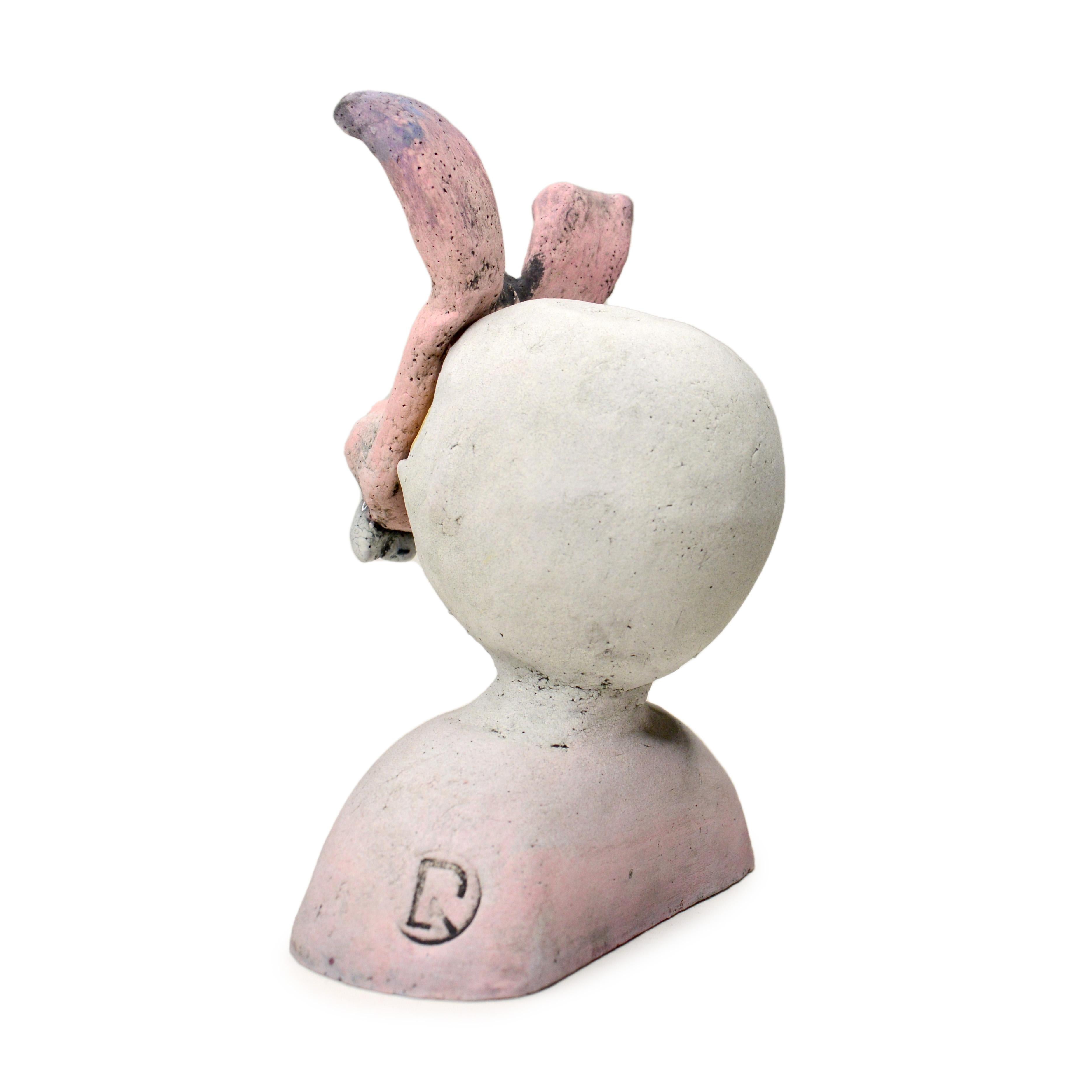 Pin·e·co 008 Ceramic Sculpture with a bunny mask fertility, luck, and creativity - Beige Figurative Sculpture by Renate Frotscher