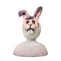 Pin·e·co 008 Ceramic Sculpture with a bunny mask fertility, luck, and creativity