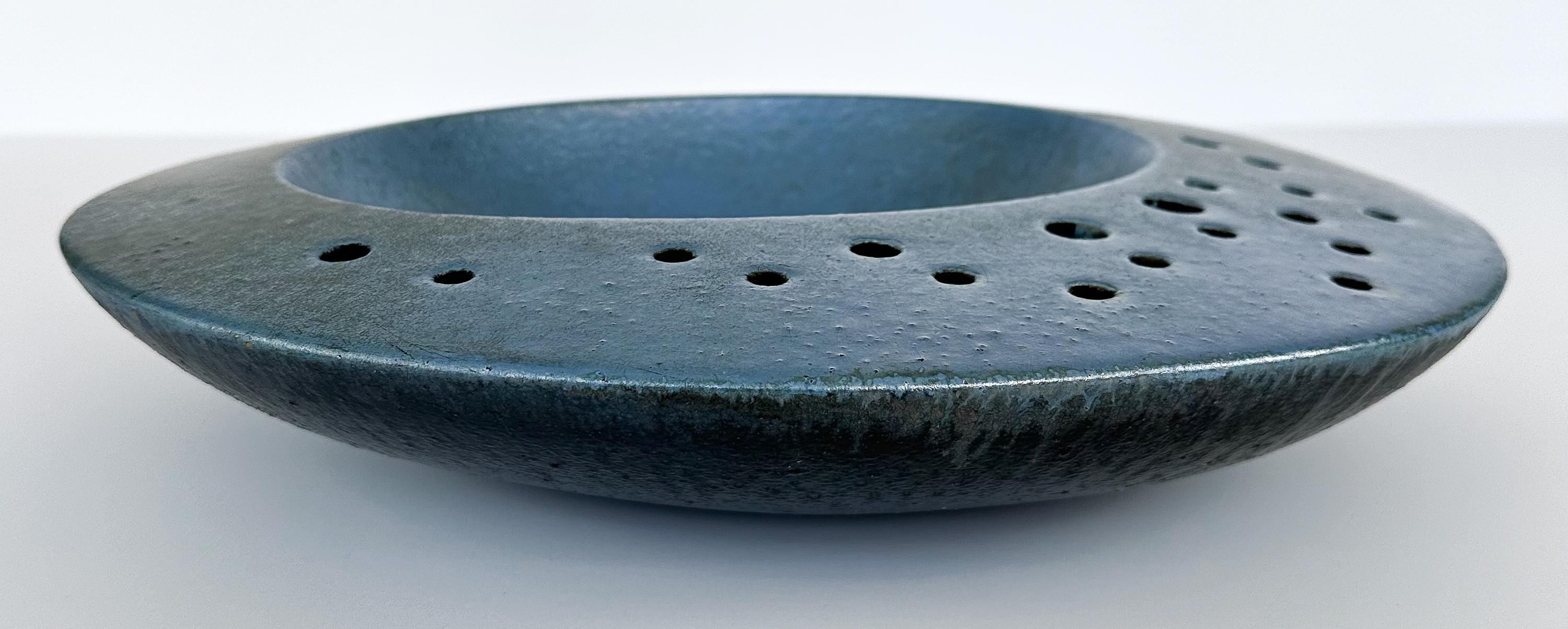 A Renato Bassoli (1915-1982) large pierced sculptural centerpiece bowl from the 'I Sassi' (stones) series made for Il Sestante, Italy circa late 1950s. This is a larger than average example of Bassoli's Il Sassi series measuring 16