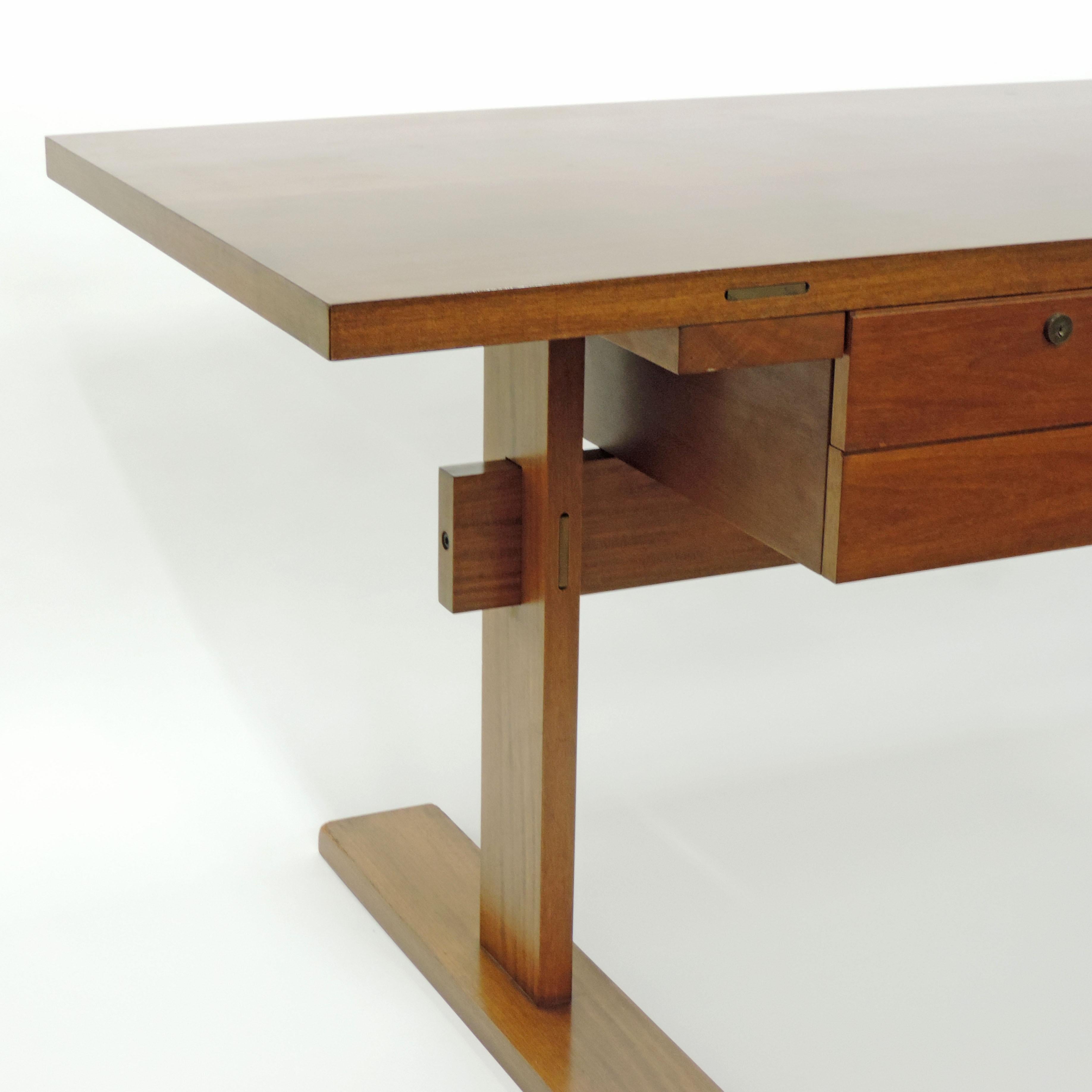 Modernist desk by Designer Renato Forti for Frangi, Italy, 1960s
Desktop and the base are held together by six bronze plates.
These desks were custom made in different variations.
Renato Forti is better known for his lighting designs for O'luce