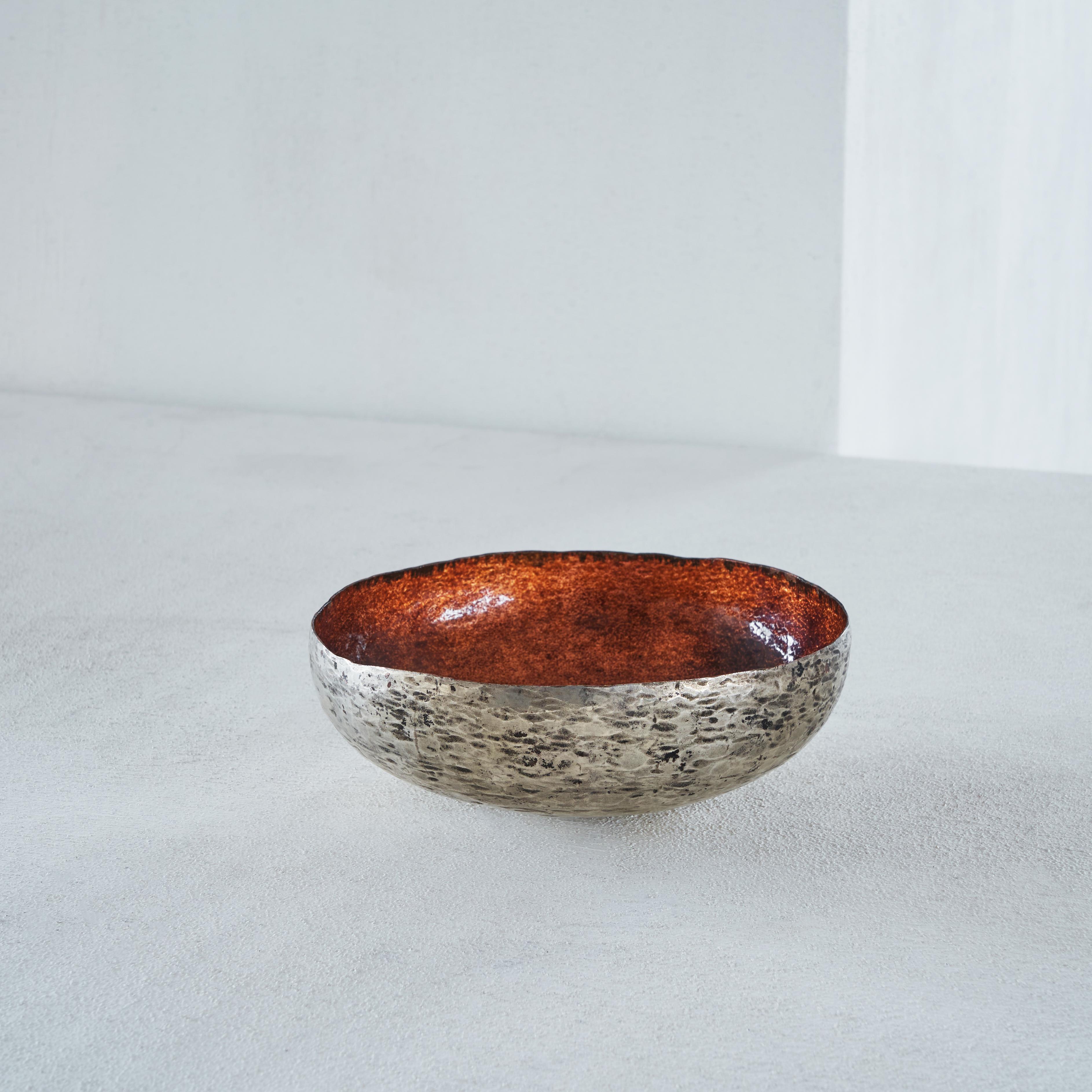 Hand hammered and enamelled bowl by Renato Vanzelli, 1960s, Italy.

This is one of the most beautiful bowls we've ever seen. A true jewel for your interior. This beautiful bowl by Renato Vanzelli (1932-1993) from Padova (Padua) in Italy is very