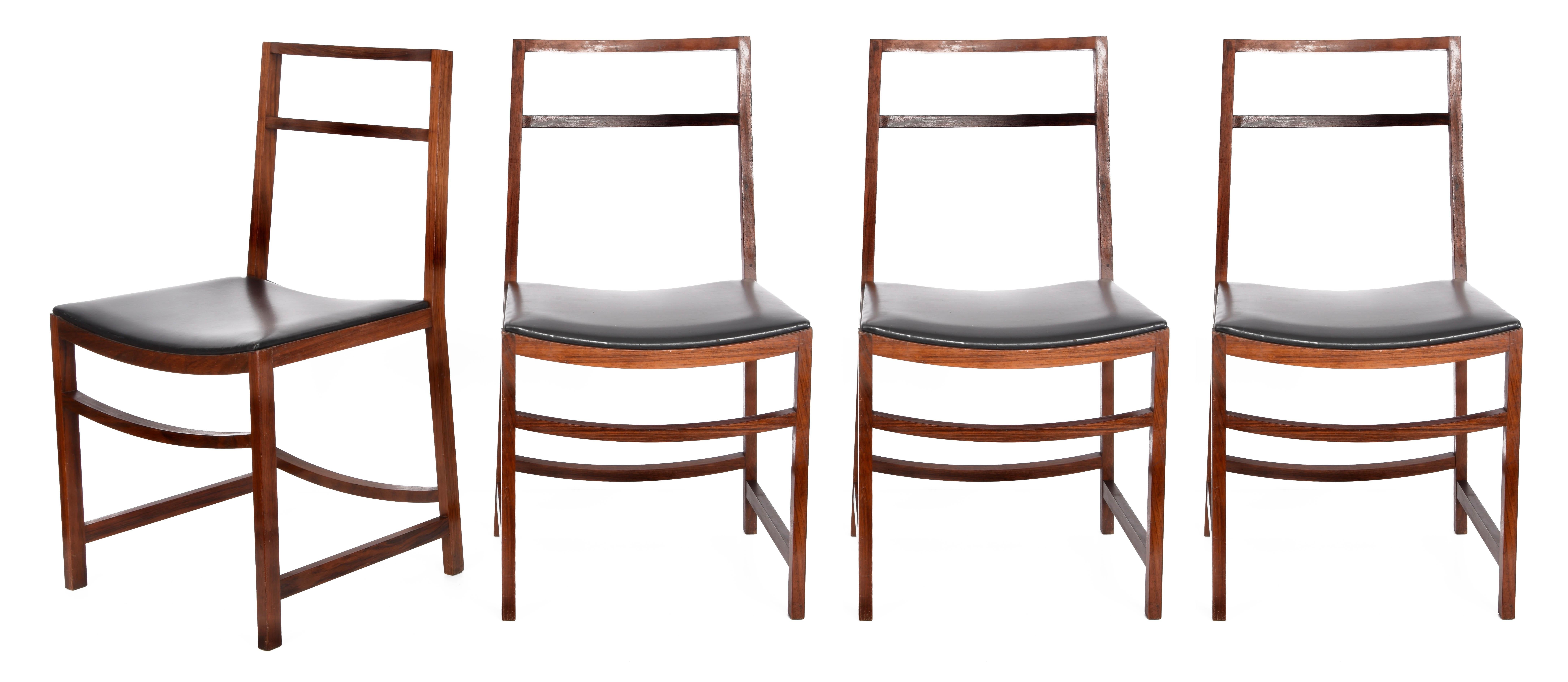 Amazing set of 4 midcentury wood and faux leather chairs. This amazing set was designed by Renato Venturi for MIM in Italy during 1960s.

This great set is made of light and solid wooded chairs and wonderfully black faux leather.

The set comes
