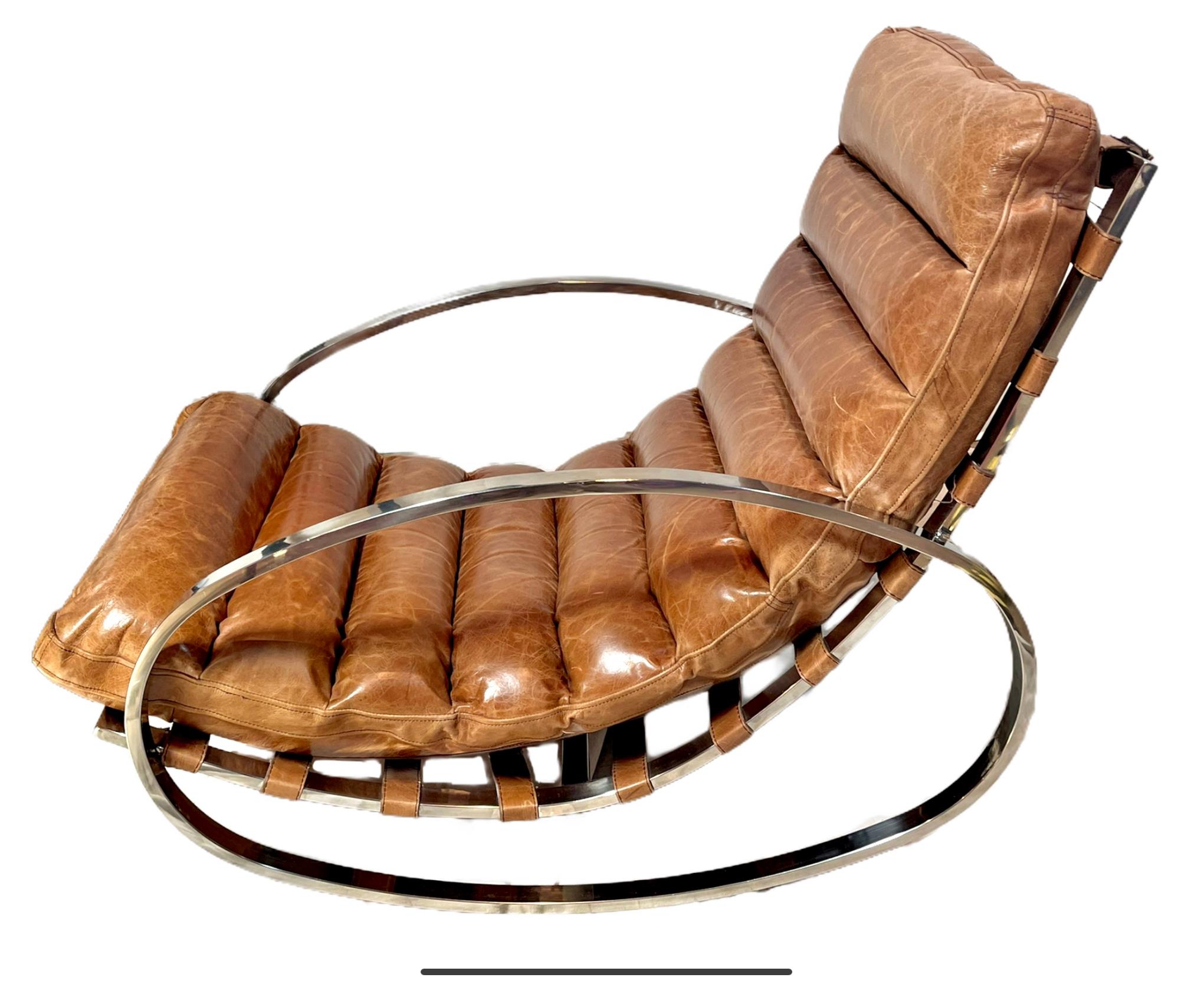 'Ellipse' rocking chair designed by Renato Zevi for Selig, Italy 1970's. Chrome-plated steel frame with original brown leather upholstery. Chrome frame. Great form and one of the hippest modernist rockers around. The chrome frame has a nice mirrored