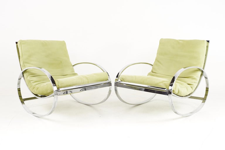 Renato Zevi for Selig Mid Century Chrome Elliptical Rocking Chairs - A Pair

Each chair measures: 27.75 wide x 42 deep x 31 high, with a seat height of 17 inches and arm height of 20.5 inches

All pieces of furniture can be had in what we call