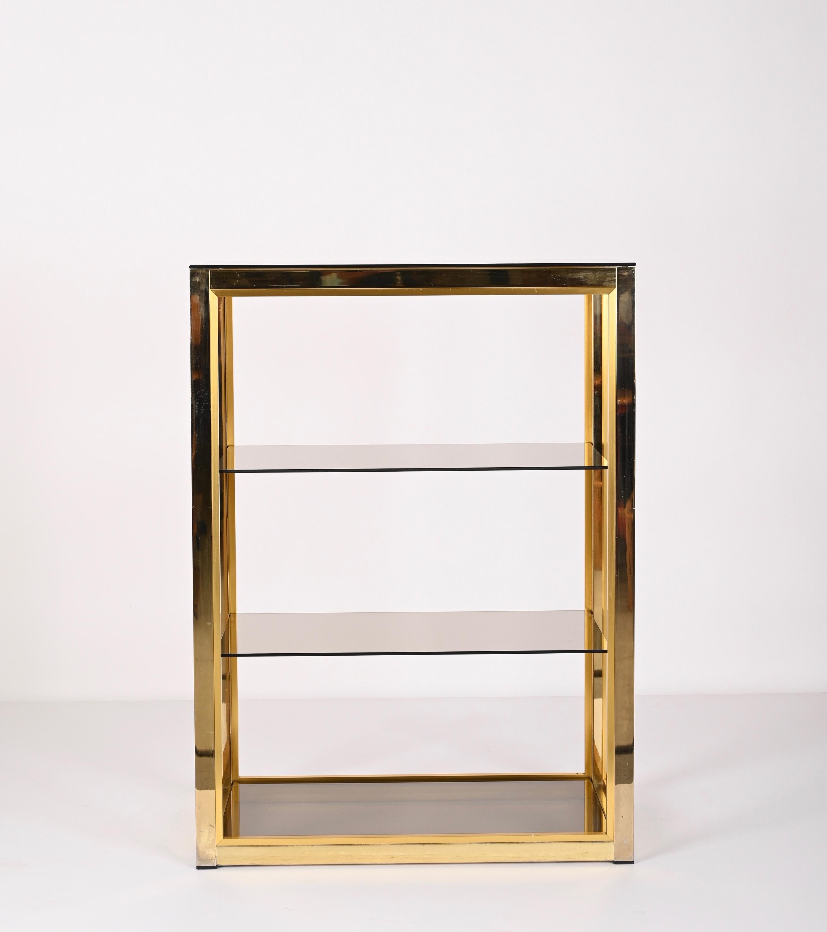Hollywood Regency Renato Zevi Gilded Brass Italian Bookcase with Glass Shelves, Romeo Rega 1970s For Sale