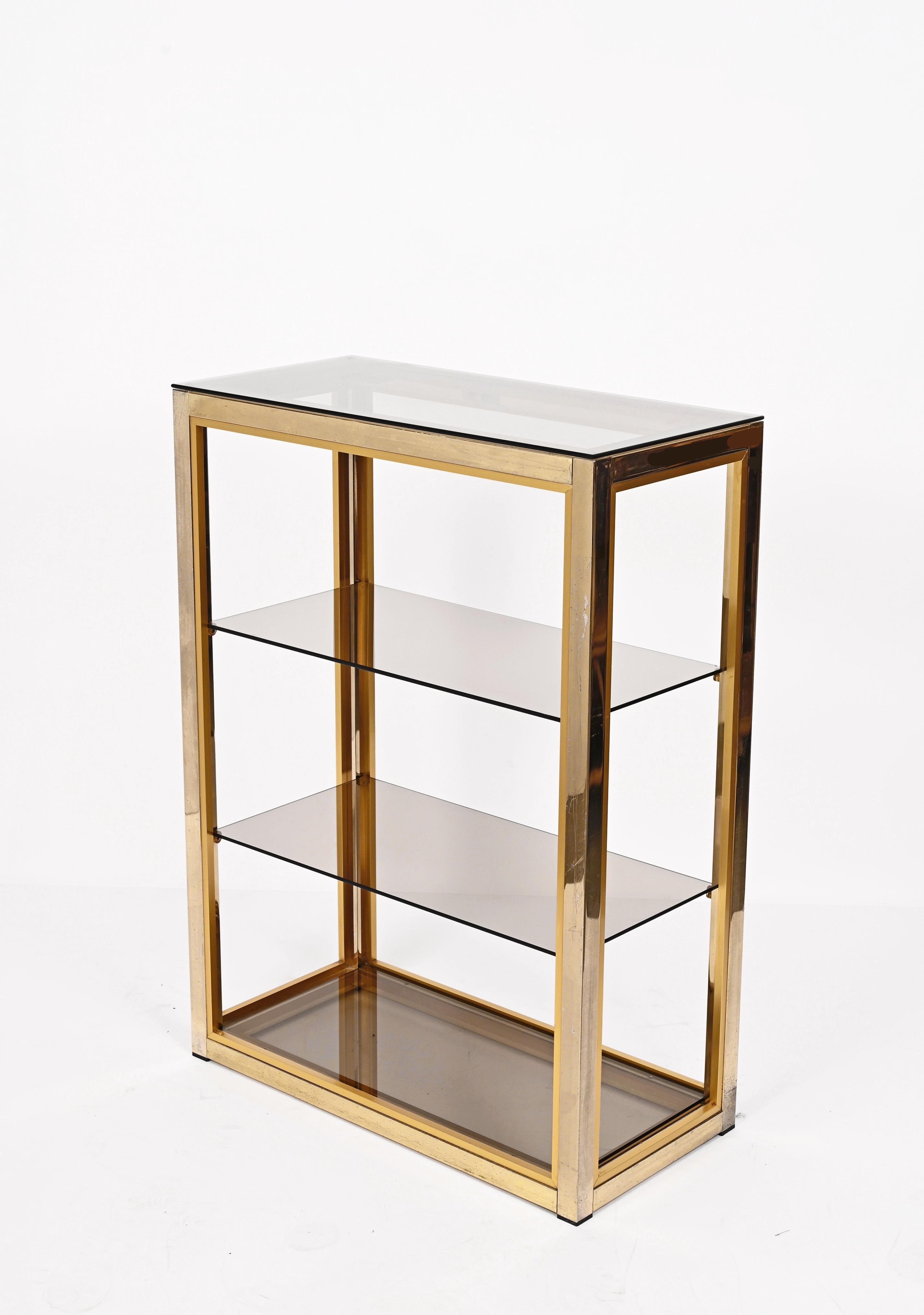 Late 20th Century Renato Zevi Gilded Brass Italian Bookcase with Glass Shelves, Romeo Rega 1970s For Sale