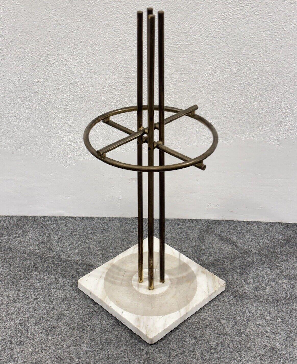Renato Zevi Marble And Brass Umbrella Stand Modern Design.

The item is in excellent conservative condition, there are no cosmetic or structural defects to report. Only slight and obvious signs of time . (Please see photos)

Height 80 cm

Diameter