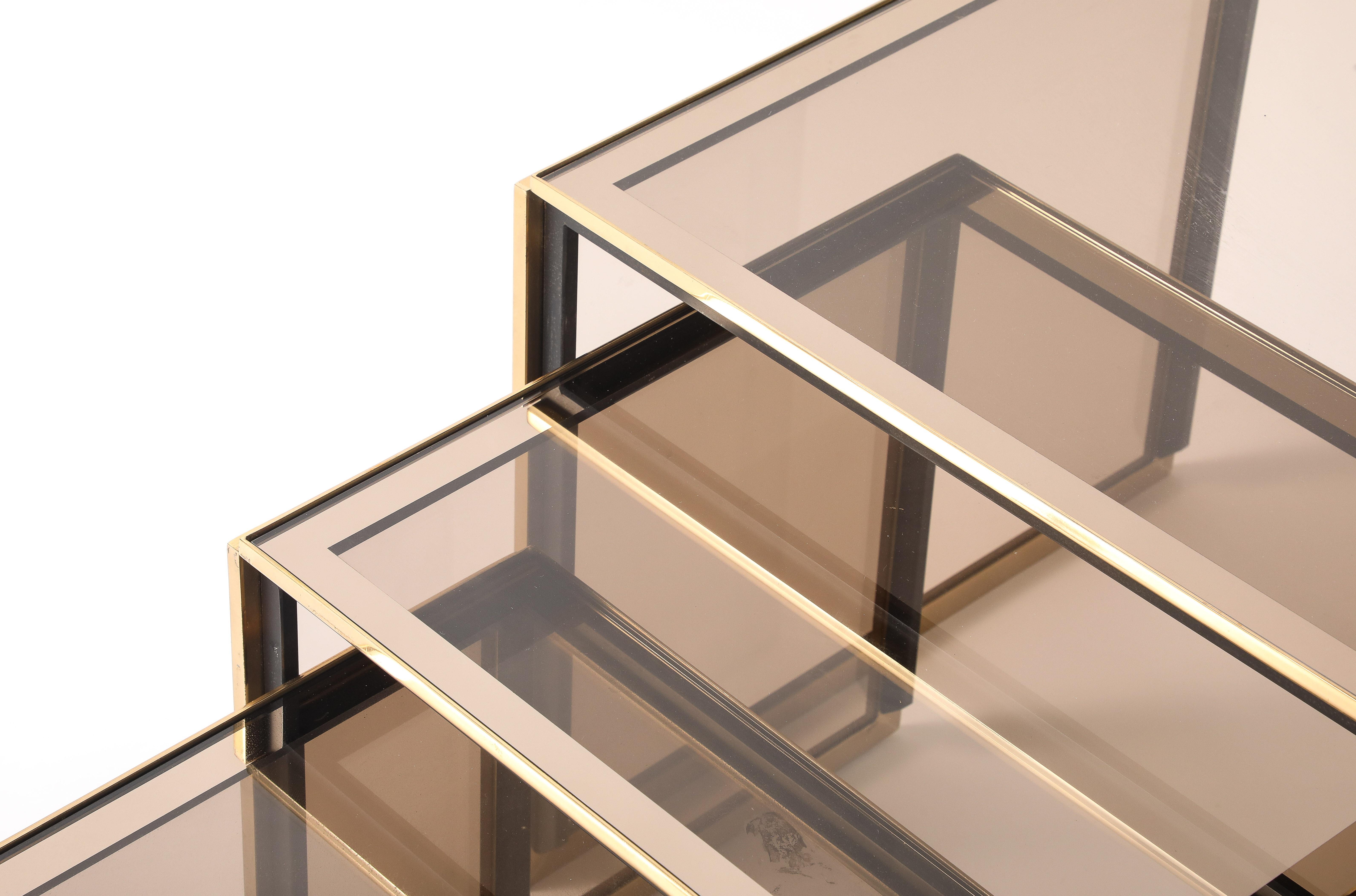 Mid-Century Modern Renato Zevi Set of Brass and Smoked Glass Nesting Tables, Italy, circa 1970 For Sale