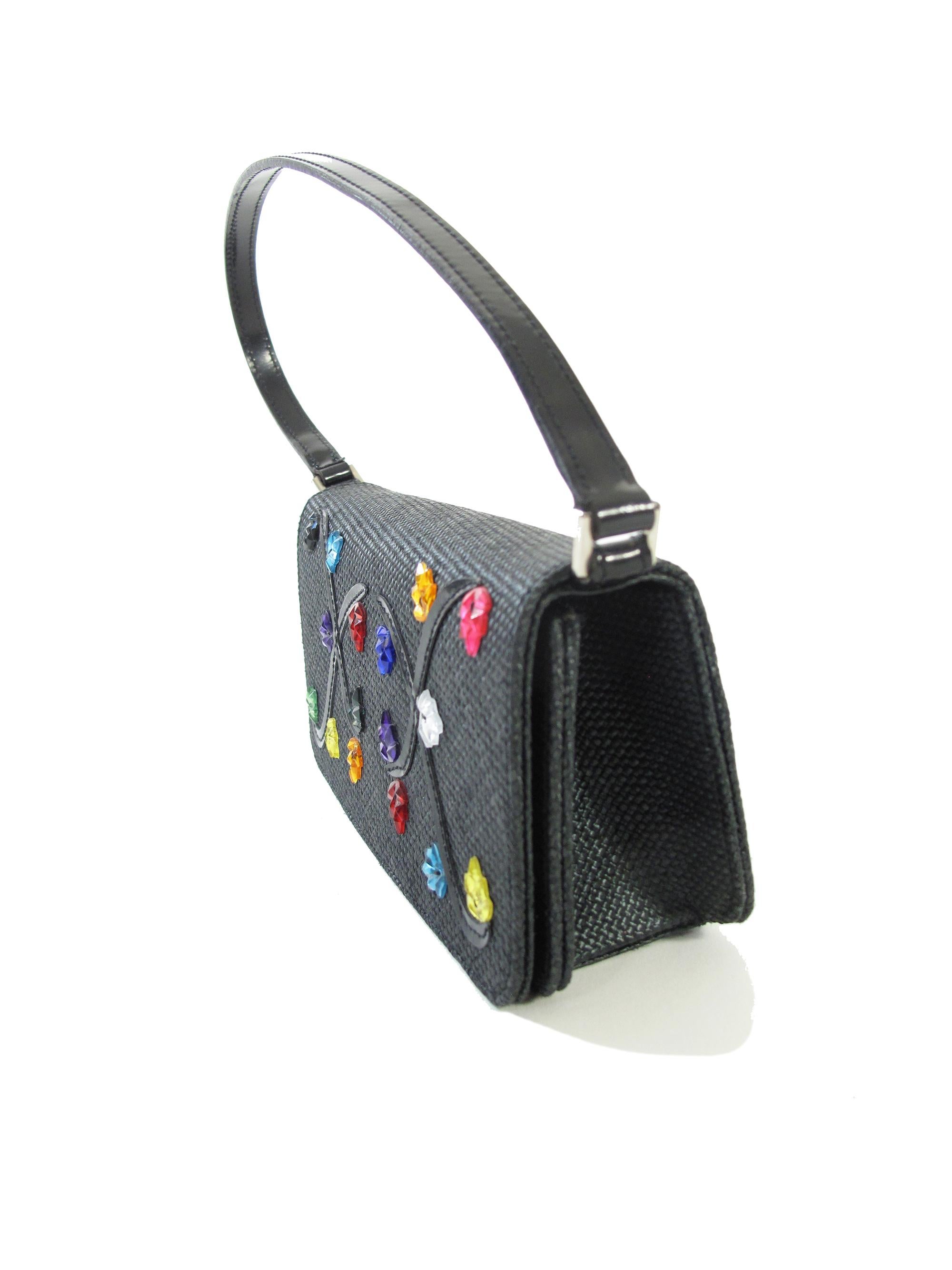 Vintage Renaud Pellegrino black raffia mini bag with jewel embellishments. Magnetic snap closure at front flap. 

3.25