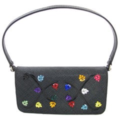 Mini sac Renaud Pellegrino en raphia noir avec ornements en bijoux