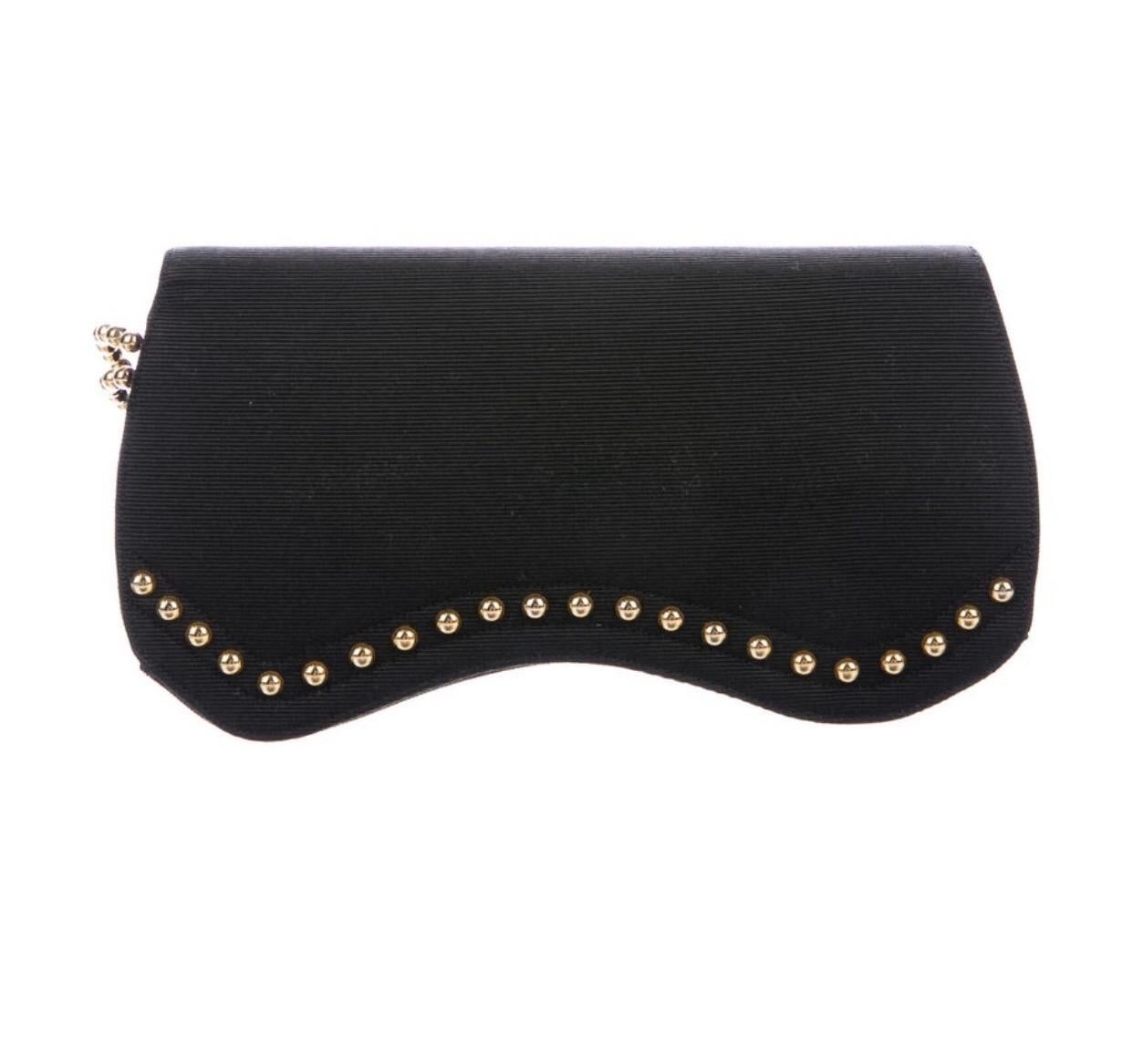 Renaud Pellegrino black fabric clutch with studs and beaded chain. 

Condition: Excellent
4.5