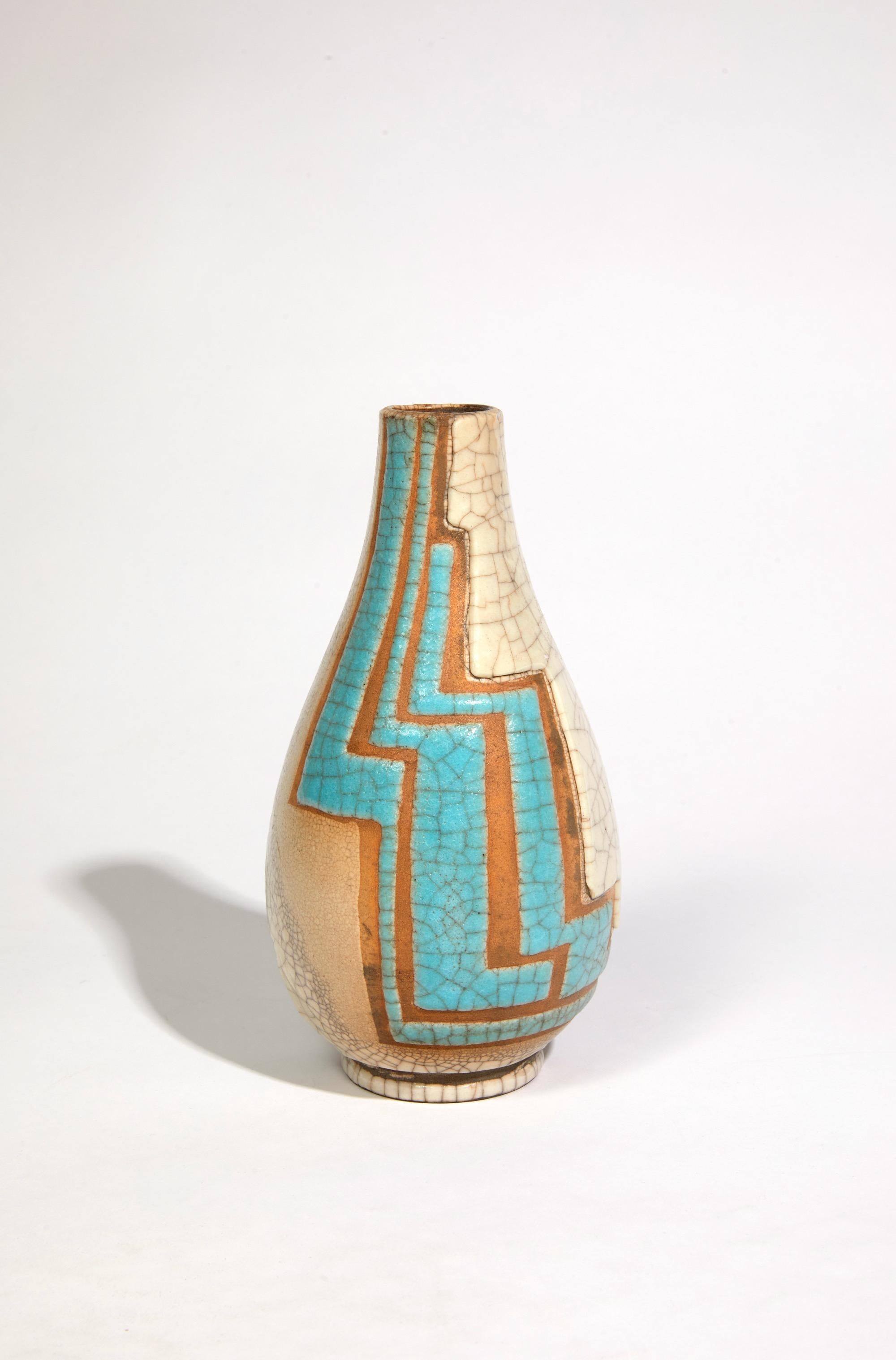 Piriform vase in glazed ceramic with geometric patterns, turquoise blue dots and ivory crackled decoration. Signed J. Doris.