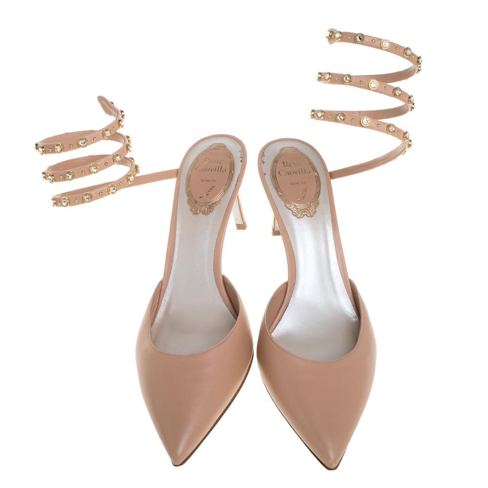 The elegance of these popular René Caovilla's sandals is matchless! They are designed in a pointed-toe silhouette with leather and feature crystal embellished straps that elegantly wrap around the ankles. The 7 cm heels provide the right amount of