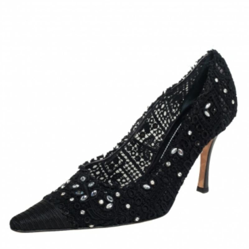 These stunning pumps by René Caovilla are the epitome of sophistication and femininity. Crafted in Italy into a pointed-toe silhouette, they are made from intricate lace and canvas. They come in a classic shade of black and are detailed with