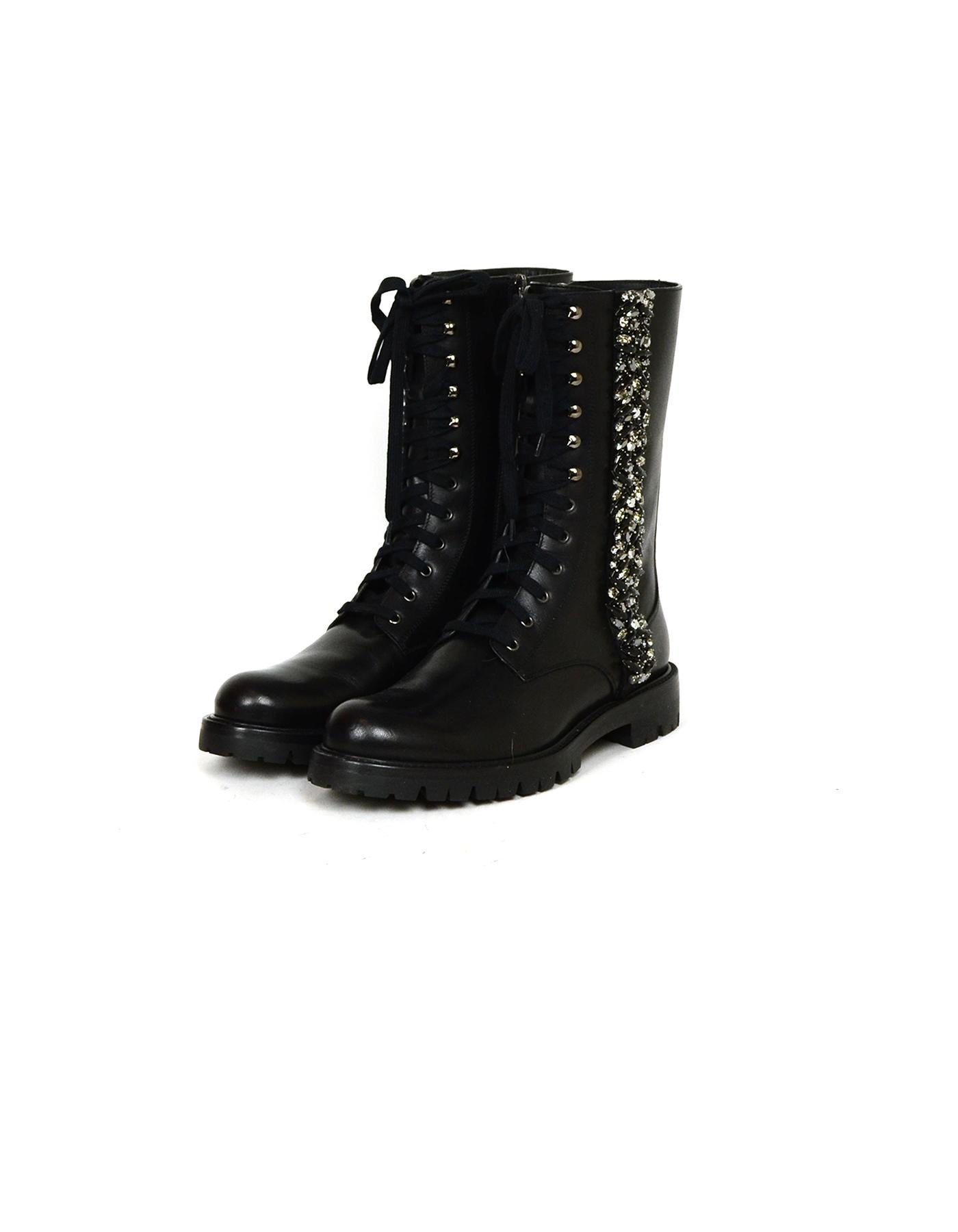 Rene Caovilla Black Leather Embellished Combat Boots sz 38

Made In: Italy
Color: Black
Hardware: Silvertone
Materials: Leather
Closure/Opening: Side Zip
Overall Condition: Excellent pre-owned condition, with the exception of some minor surface