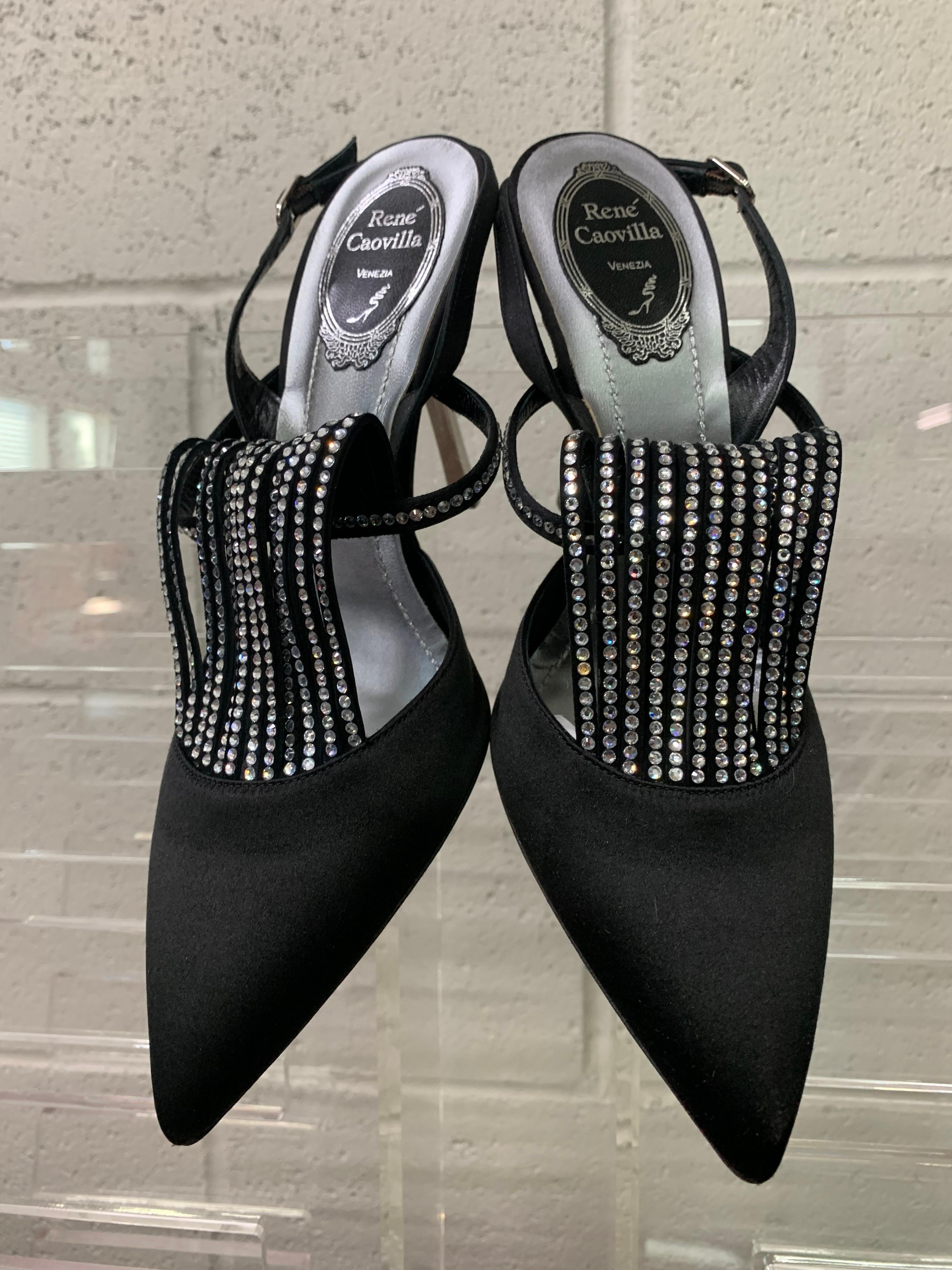 Rene Caovilla Black Peau de Soie Slingback Pumps w Rhinestone Fan-Shaped Throat: Silver Stiletto Heel. New, Never Worn.  Silver metallic leather soles. Size 8.5B