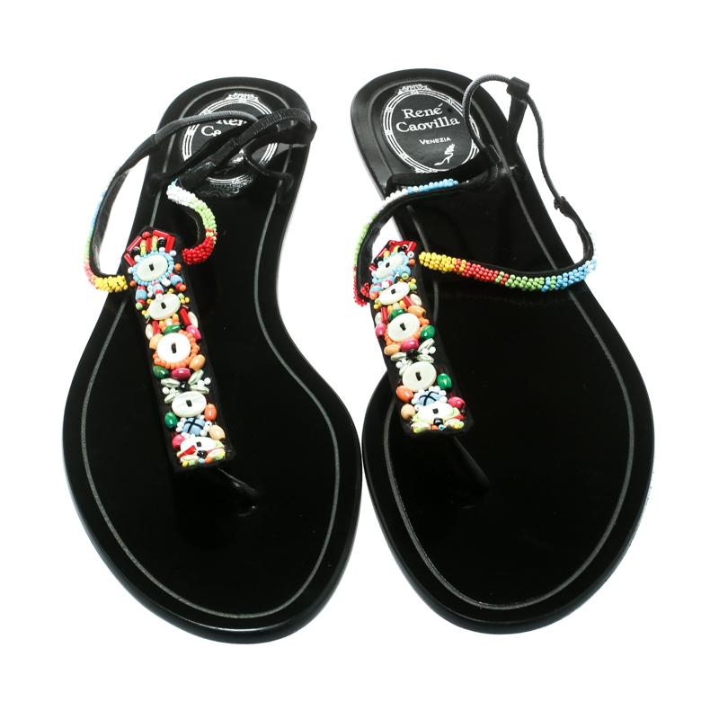 Wear these satin flats to a party and draw all eyes towards you. Team these shoes lined in leather with a pretty dress at an evening function and look your best. These embellished flats from René Caovilla are funky and stylish, designed just for the