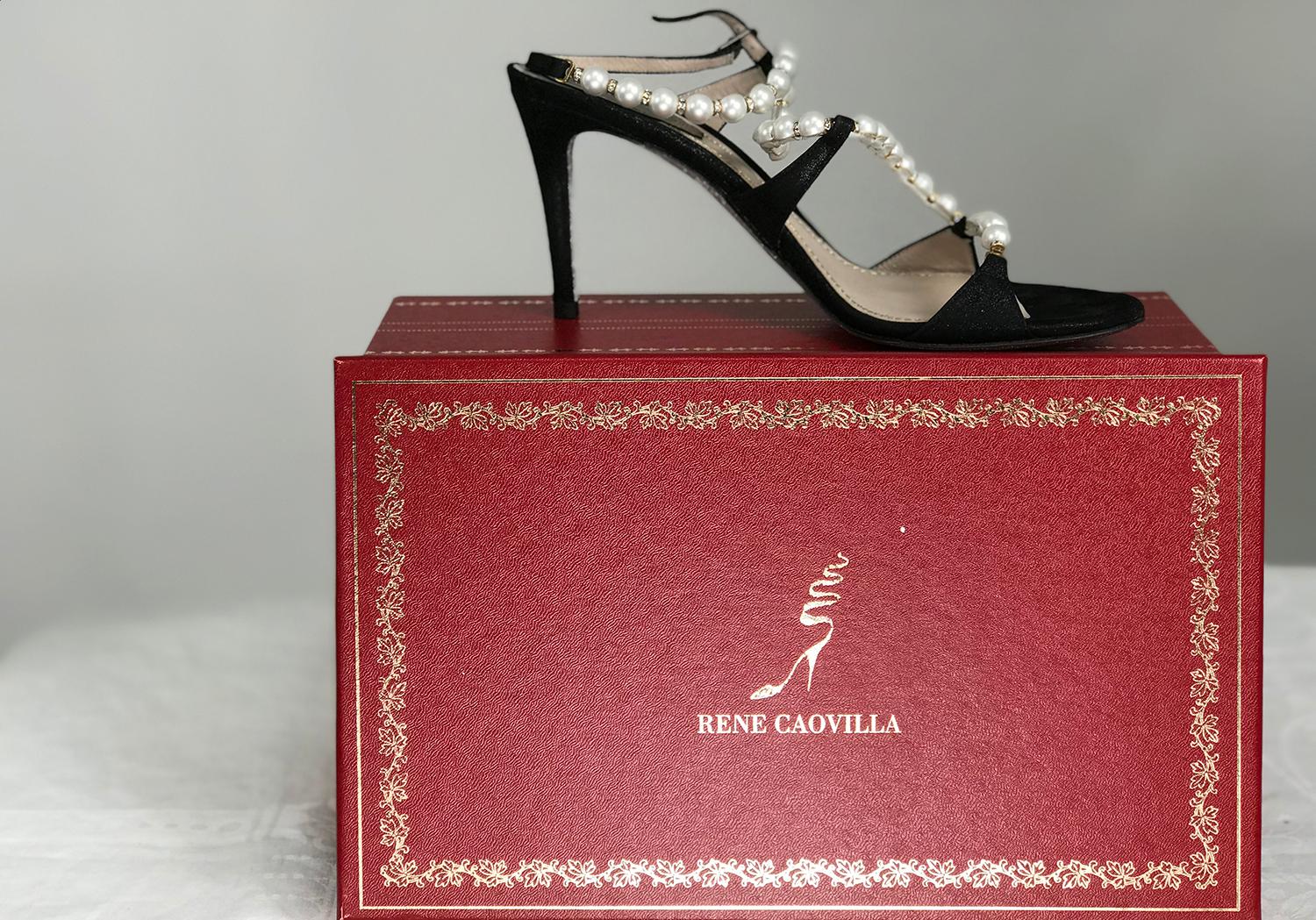 Rene Caovilla Black Wendy faux pearl and rhinestone, metallic suede ankle strap high heels, 36 1/2.  3 1/2 inch heels. With box and protector bags. They look barely, if ever worn. Gorgeous shoes.