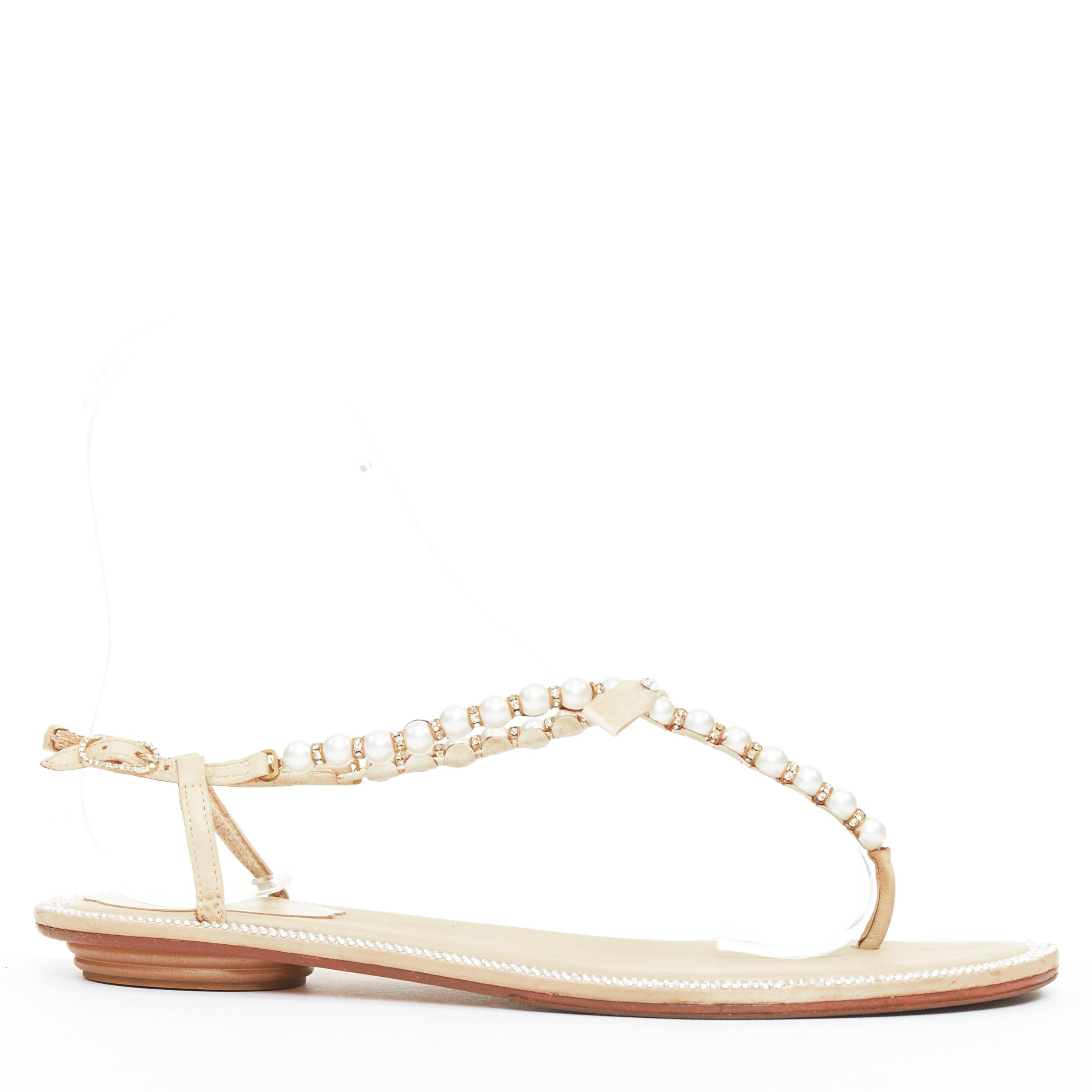 RENE CAOVILLA Creme Schleife faux Perle tstrap Strass trim flache Sandalen EU36
Referenz: GEGG/A00225
Marke: Rene Caovilla
MATERIAL: Perlenimitat, Leder
Farbe: Nackt, Perle
Muster: Solide
Verschluss: Gürtel
Innenfutter: Nacktes Leder
Hergestellt in: