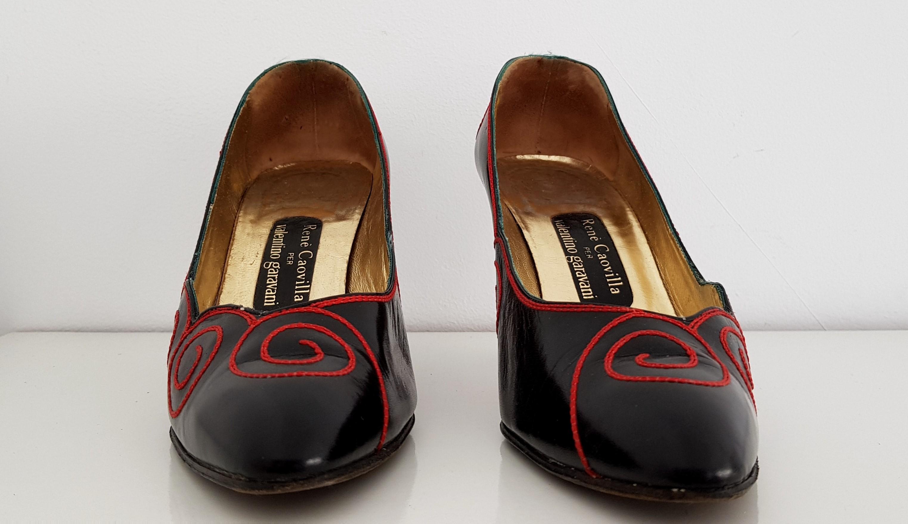 Designed by René Caovilla for Valentino Garavani.
Black with Red spirals Leather Heels. 
Limited and Rare Edition.

Conditions: Perfect conditions on the outside with some signs of wear on the inside and on the sole of the shoe.

Heel height: 8
