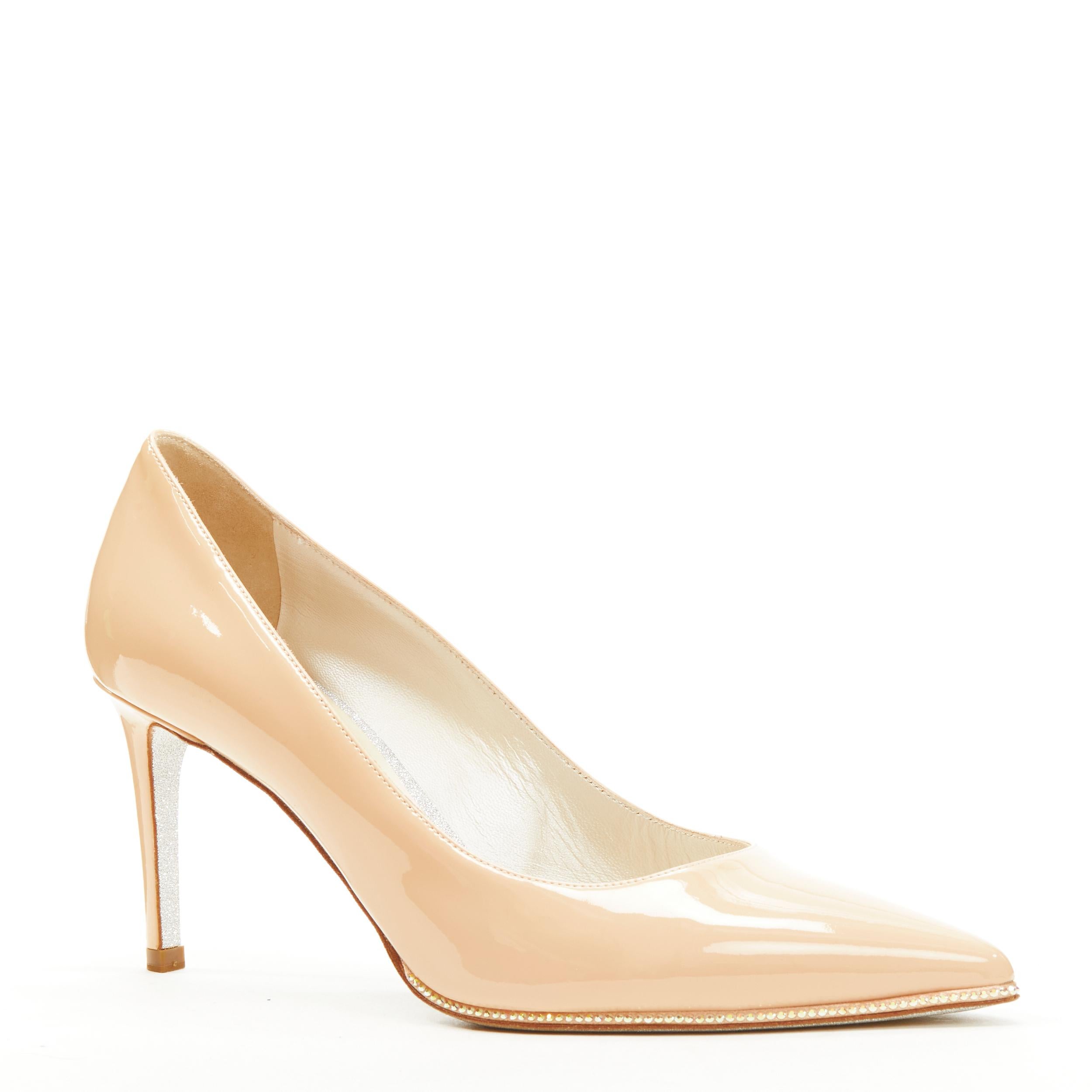 RENE CAOVILLA nude beige patent leather strass toe box pigalle pump EU37.5
Brand: Rene Caovilla
Material: Patent Leather
Color: Beige
Pattern: Solid
Extra Detail: Crystal embellishment along outsole at toe box. Silver glitter sole.
Made in: