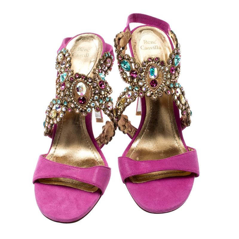 Dazzle wherever you go in these fabulous sandals from René Caovilla. Beautifully designed, they carry suede straps at the front and breathtaking crystal-embellished ankle straps. The insoles are leather-lined to provide comfort and the 10.5 cm heels