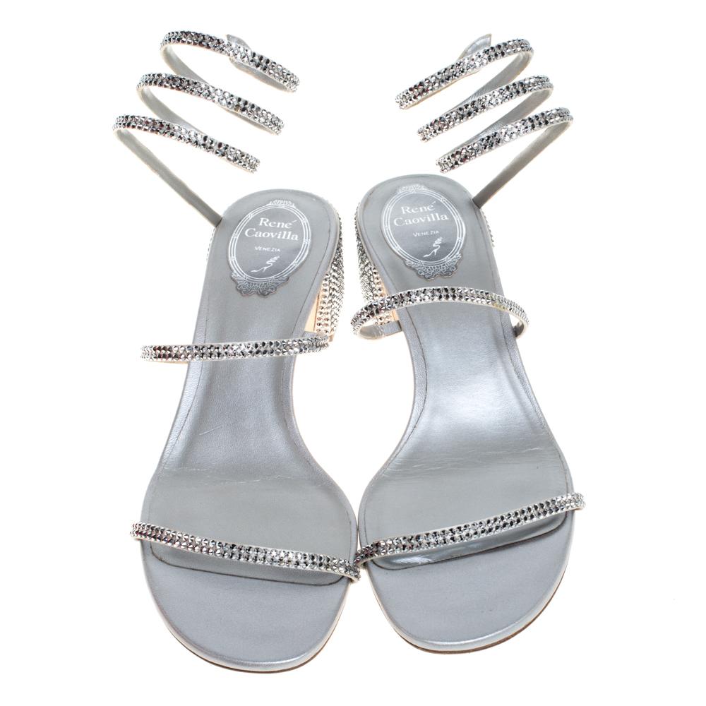 Sparkly sandals are a closet essential, and there's no reason why yours must be left behind. No better start than with these from René Caovilla! They have straps embellished with crystals and they are constructed in such a way that there are two