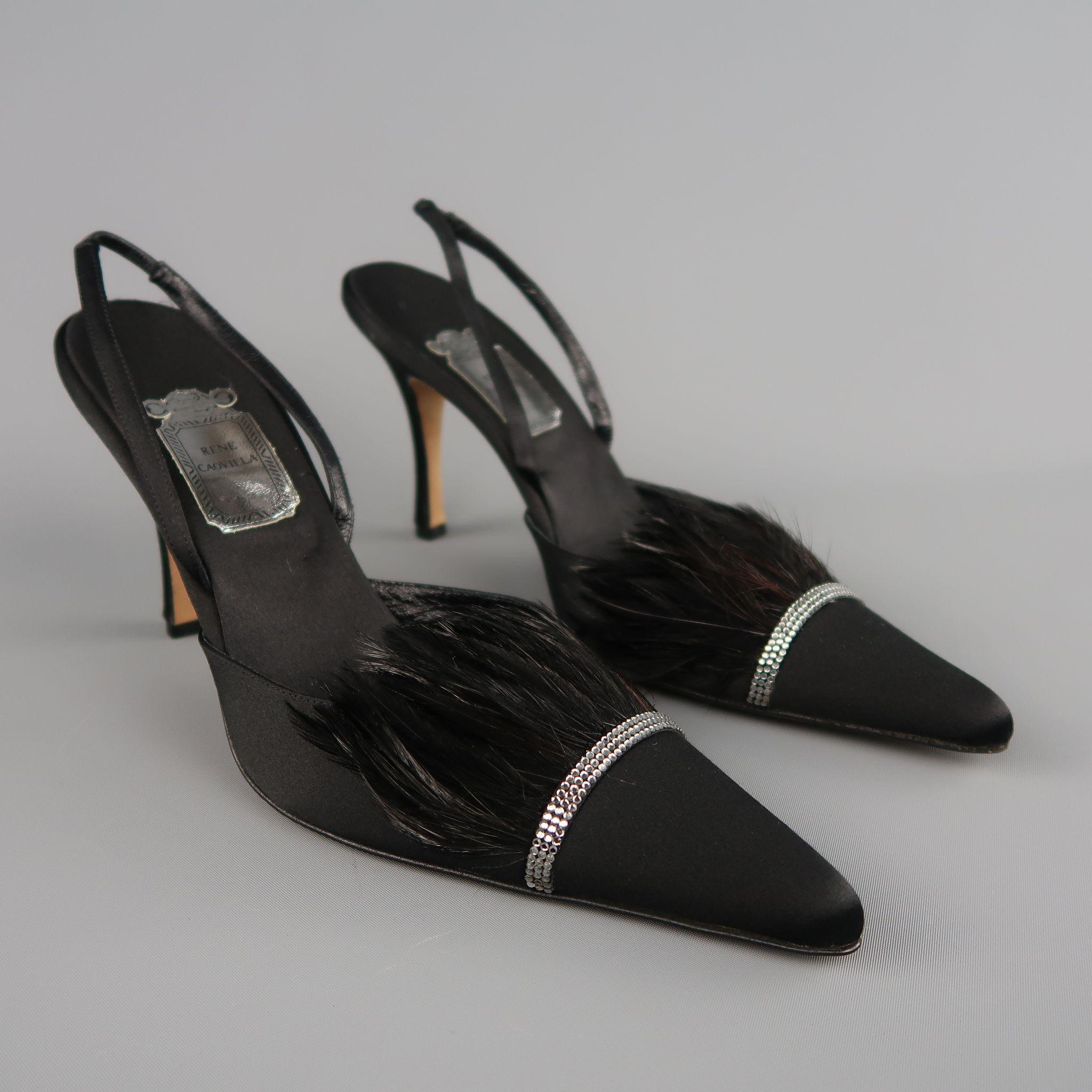 These fabulous evening pumps by RENE CAOVILLA slingback pumps come in black silk satin and feature a pointed toe with rhinestone and feather trim embellishment with a covered stiletto heel. Never worn. Made in Italy.  Retailed at $1195
 
New without