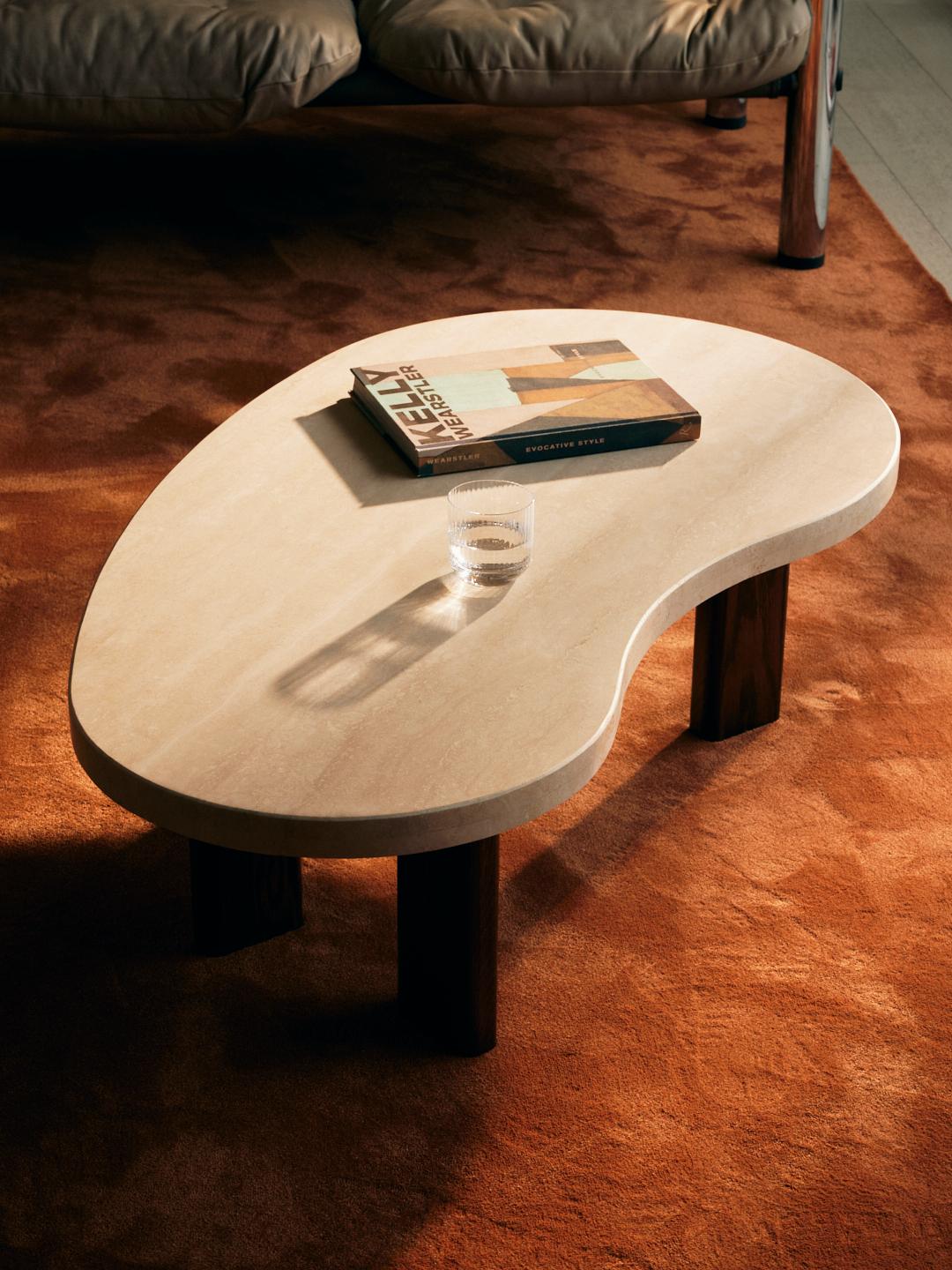 Rene Coffee Table in Walnut stained natural oak and Travertine. 

Designed by Just Adele and handcrafted locally by skilled Artisans. 

Organic shapes with soft curved edges, elevated by the perfect mix of natural materials; stone and solid timber.